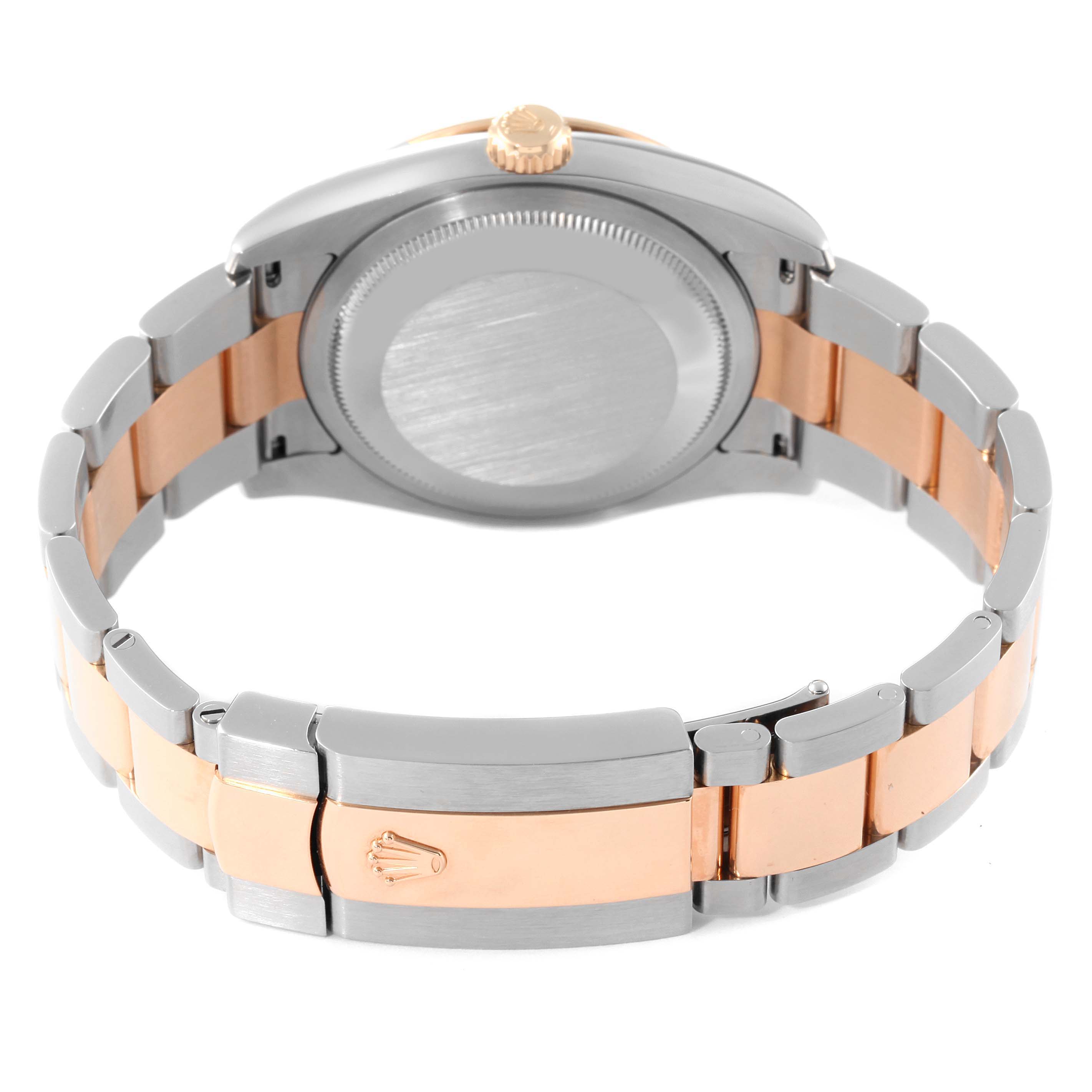 The image shows the back of a Rolex Turn-o-Graph 116261 Men's Steel and Gold (two tone) Silver Dial 116261 Men's Steel and Gold (two tone) Silver Dial model, highlighting its case back and two-tone bracelet.