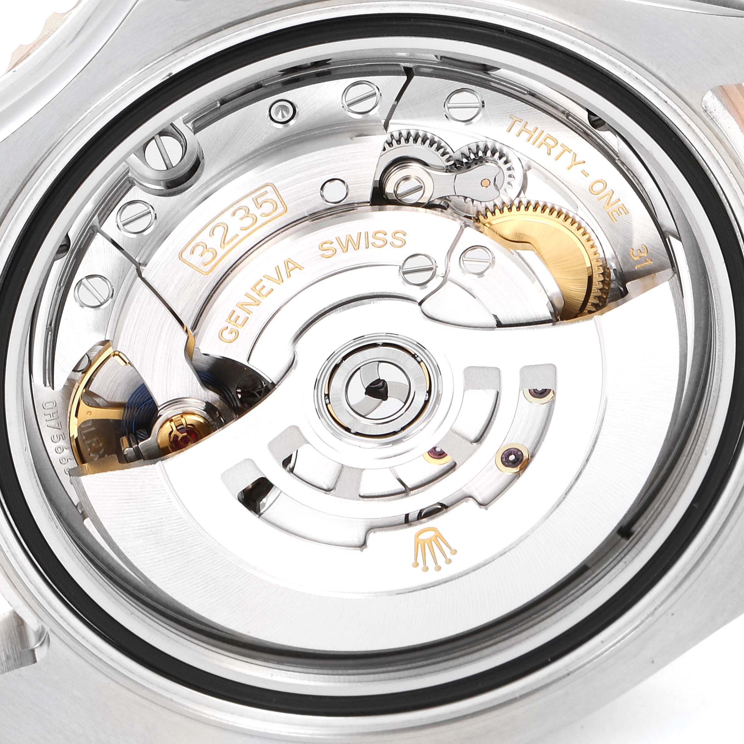 The image shows the intricate internal mechanism of a Rolex Yacht-Master 126621 Men's Steel and Gold (two tone) Brown Dial 126621 Men's Steel and Gold (two tone) Brown Dial watch, specifically the 3235 movement.