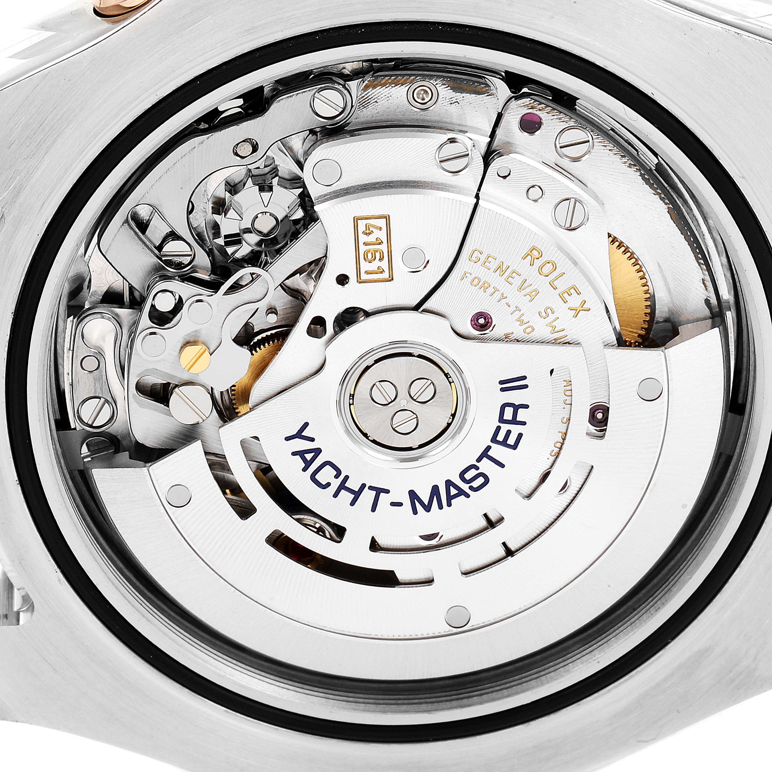 The image shows the internal mechanism of the Rolex Yacht-Master 116681 Men
s Steel and Gold (two tone) White Dial 116681 Men
s Steel and Gold (two tone) White Dial model, including gears and the rotor.