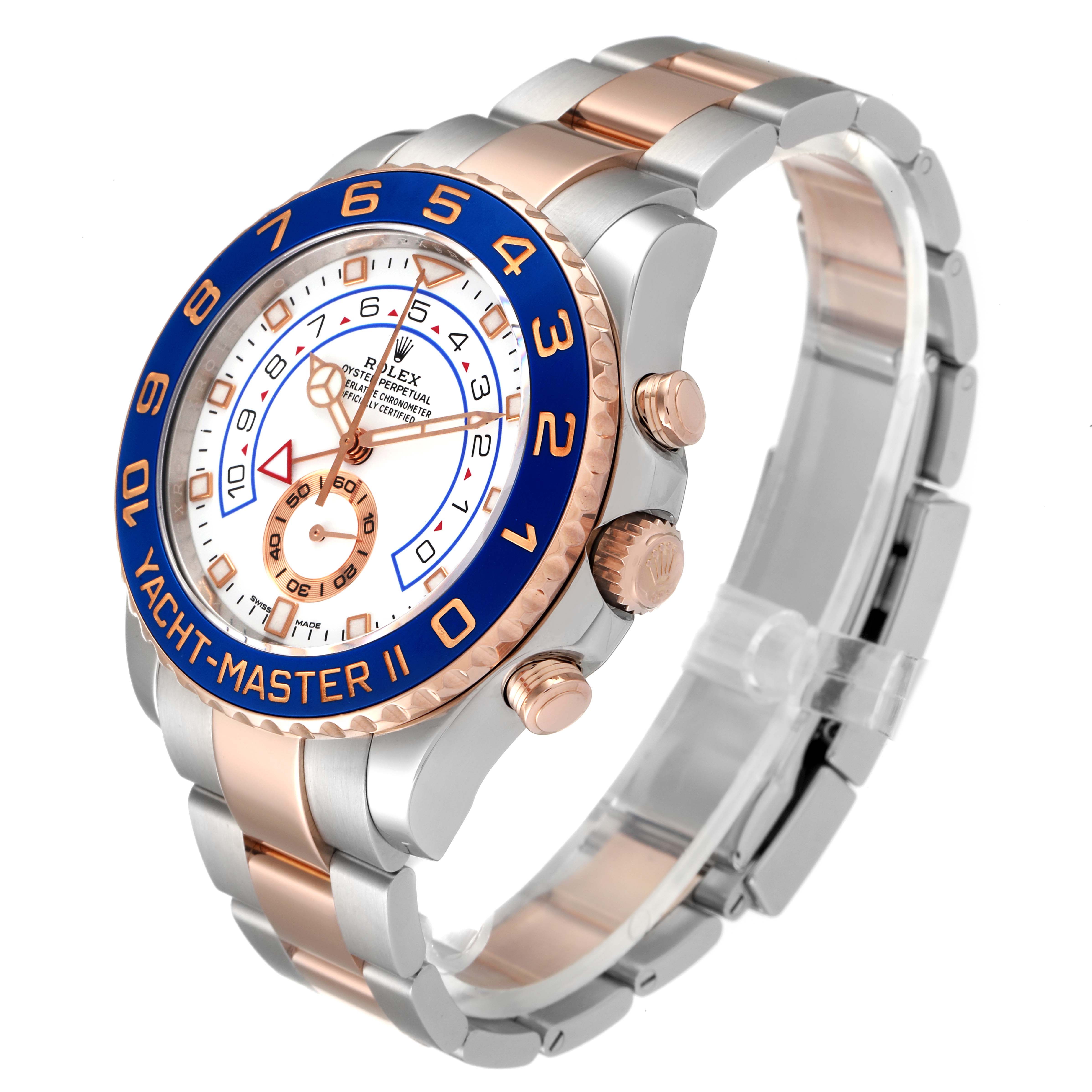 This Rolex Yacht-Master 116681 Men
s Steel and Gold (two tone) White Dial 116681 Men
s Steel and Gold (two tone) White Dial watch is shown at an angle highlighting the face, bezel, crown, and bracelet.