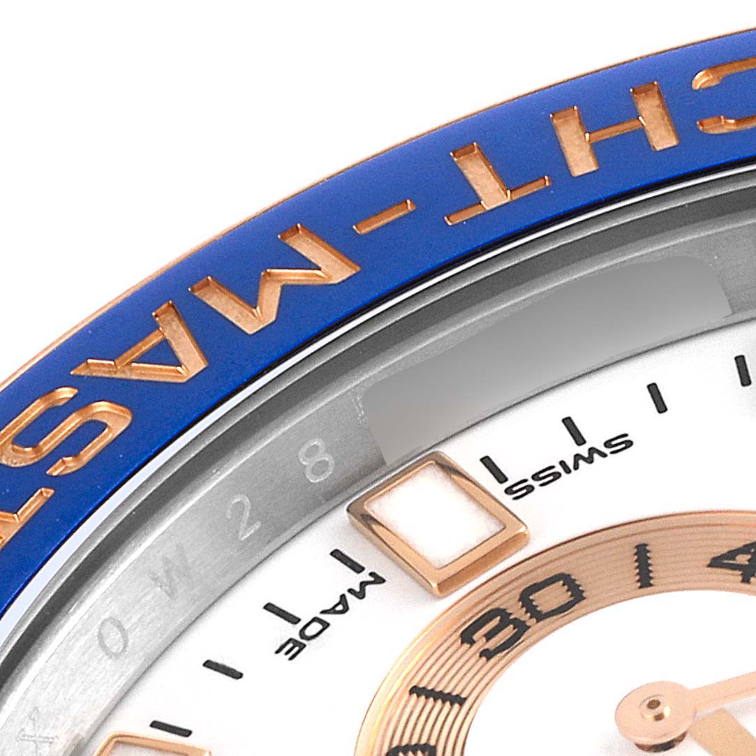 The image shows a close-up view of the Rolex Yacht-Master 116681 Men
s Steel and Gold (two tone) White Dial 116681 Men
s Steel and Gold (two tone) White Dial bezel and part of the dial.