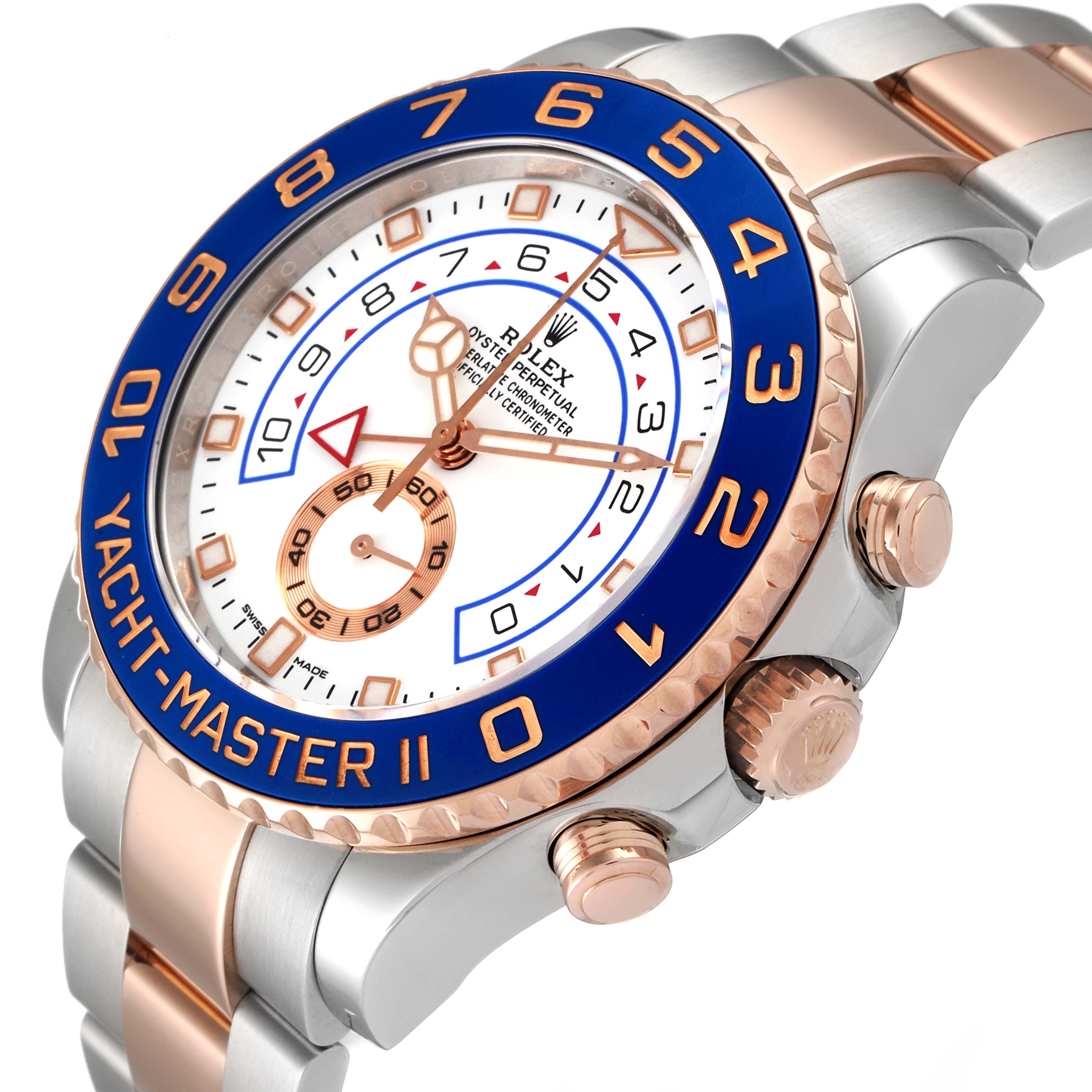 The image shows a Rolex Yacht-Master 116681 Men
s Steel and Gold (two tone) White Dial 116681 Men
s Steel and Gold (two tone) White Dial II watch from a three-quarter angle, highlighting the face, bezel, and crown.