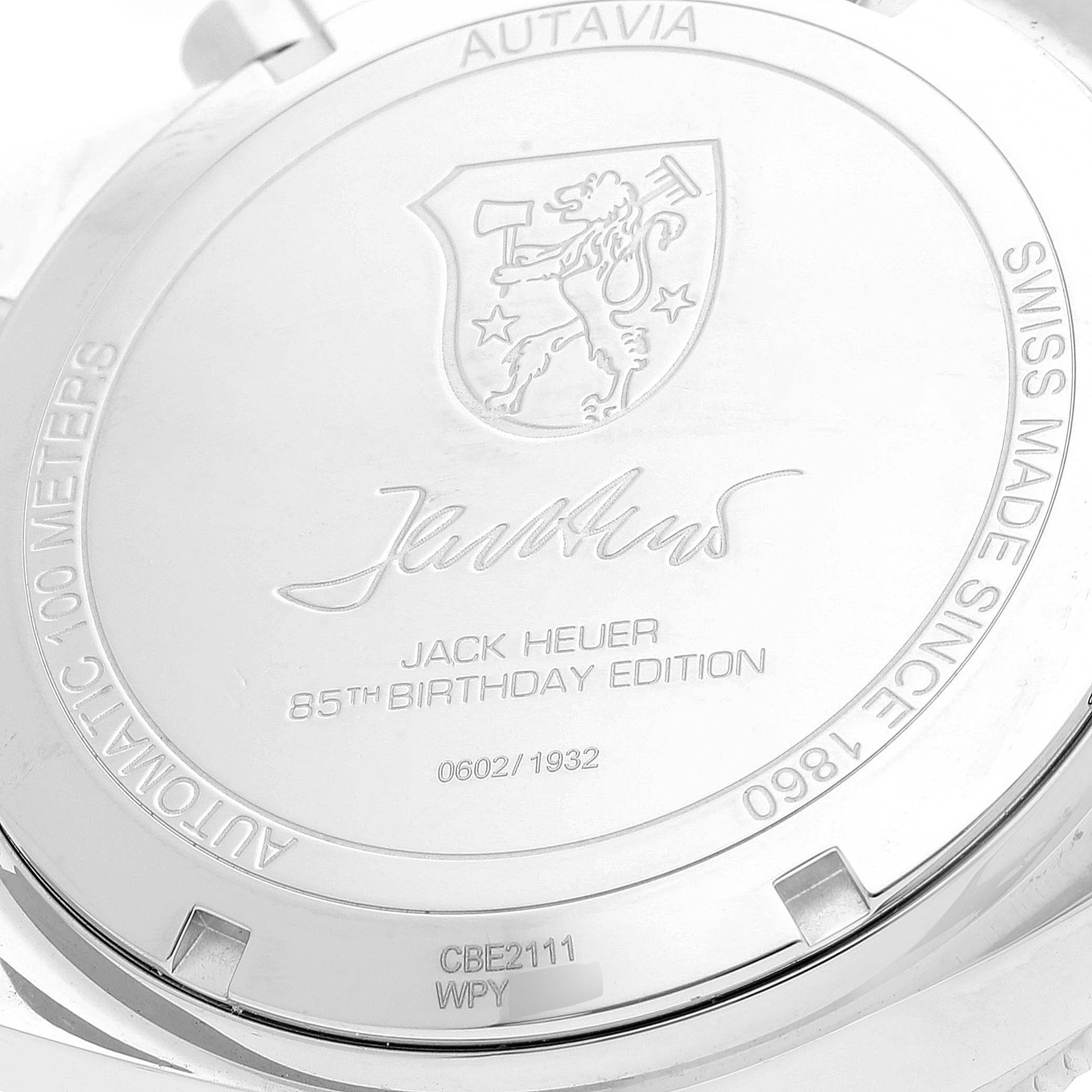 The image shows the back case of a Tag Heuer Autavia CBE2111.BA0687 Men's Stainless Steel Silver Dial CBE2111.BA0687 Men's Stainless Steel Silver Dial watch, featuring an engraving that includes "Jack Heuer 85th Birthday Edition."