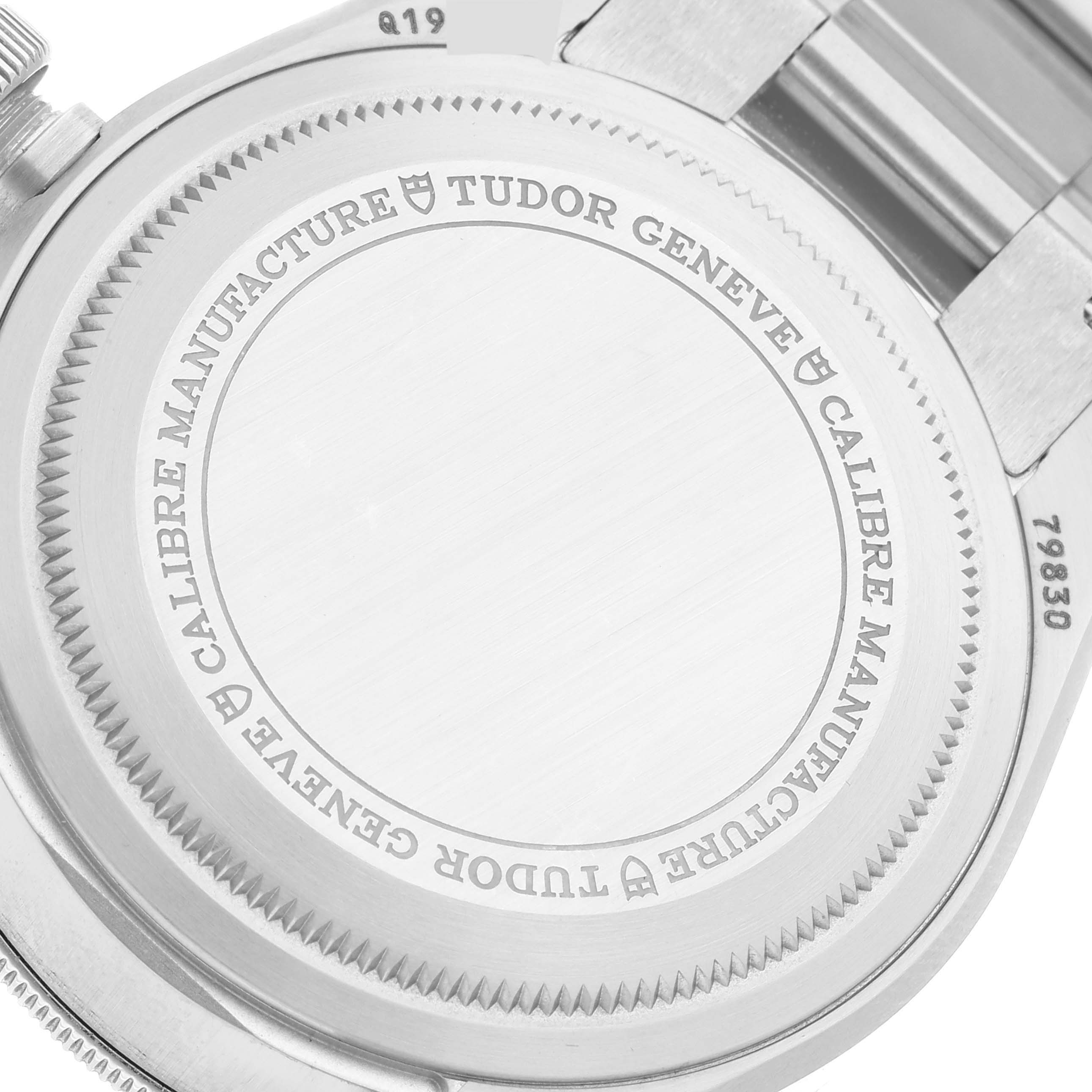 This is the back case of a Tudor Heritage Black Bay 79830RB Men
s Stainless Steel Black Dial 79830RB Men
s Stainless Steel Black Dial watch, showing the engraved details and part of the bracelet.