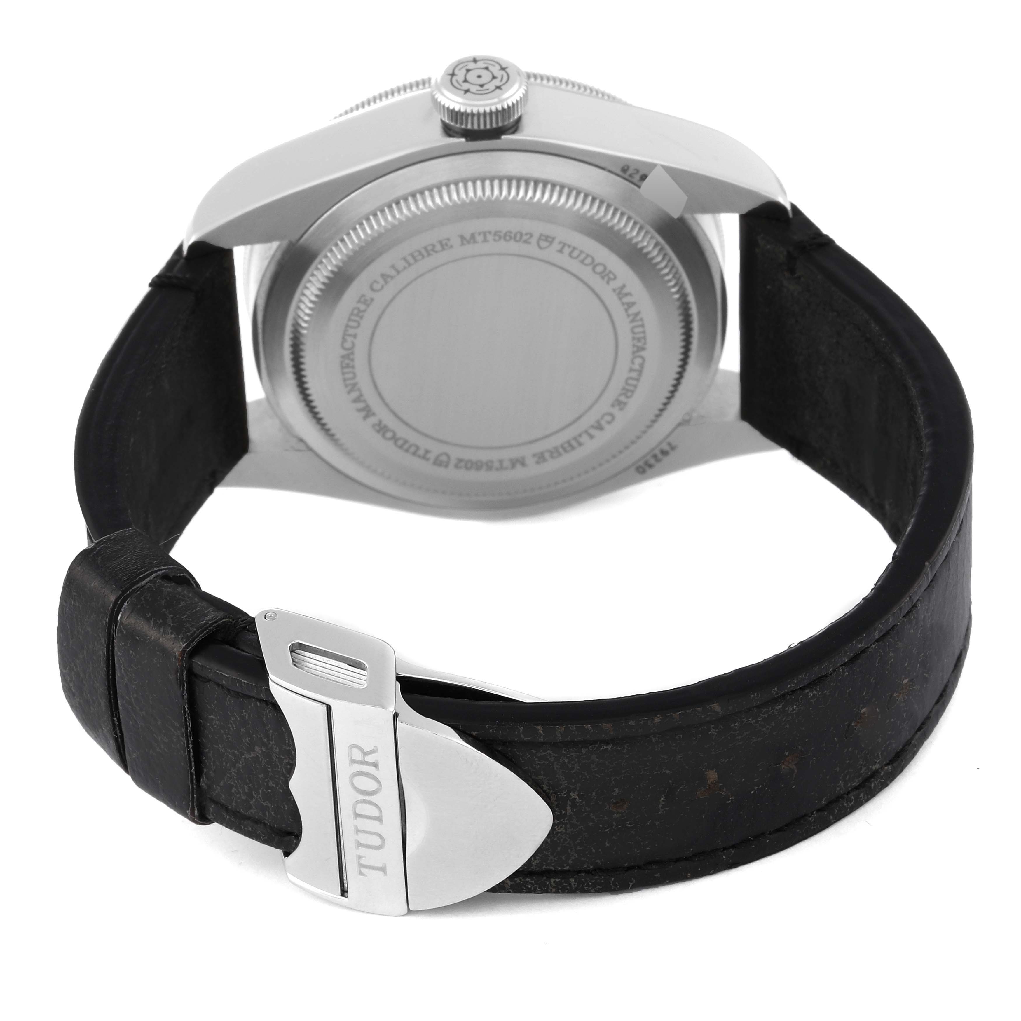The image shows the back case, crown, and leather strap with clasp of a Tudor Heritage Black Bay 79230 Men's Stainless Steel Black Dial 79230 Men's Stainless Steel Black Dial watch.