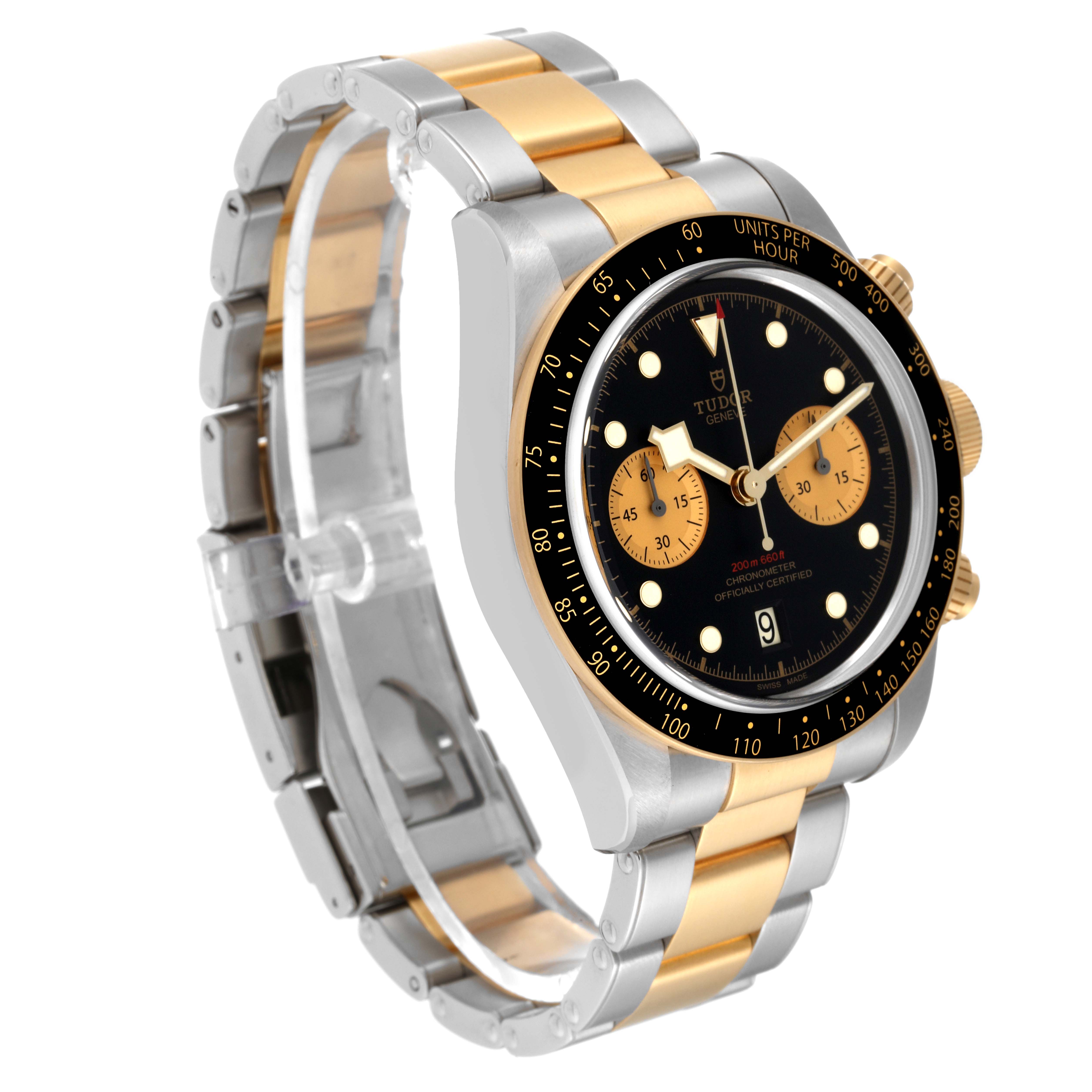 The image shows the Tudor Heritage Black Bay 79363N Men
s Steel and Gold (two tone) Black Dial 79363N Men
s Steel and Gold (two tone) Black Dial watch from a three-quarter view, highlighting its bezel, dial, and two-tone bracelet.