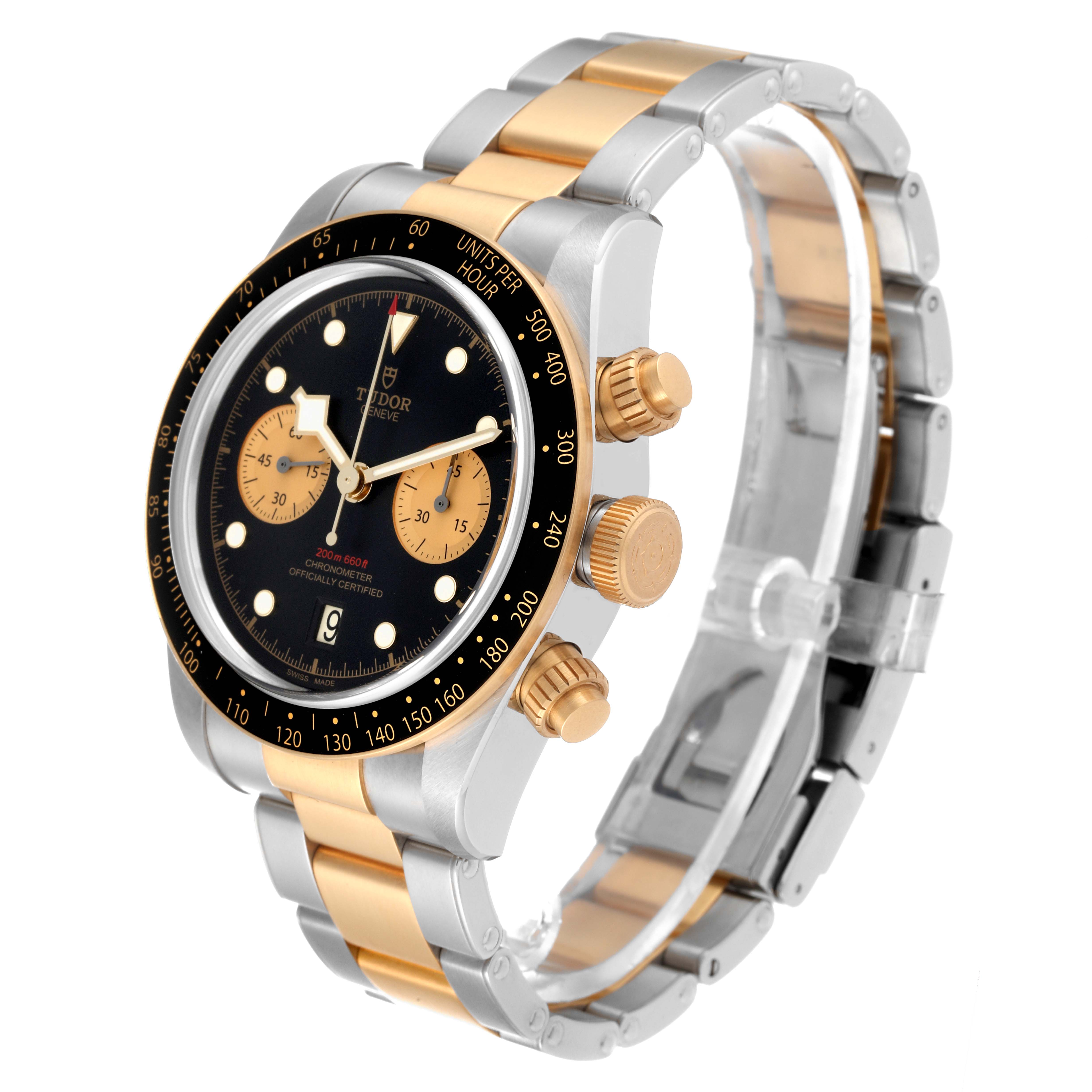 The Tudor Heritage Black Bay 79363N Men
s Steel and Gold (two tone) Black Dial 79363N Men
s Steel and Gold (two tone) Black Dial watch is shown from a three-quarter side angle, highlighting its bezel, dial, and two-tone bracelet.