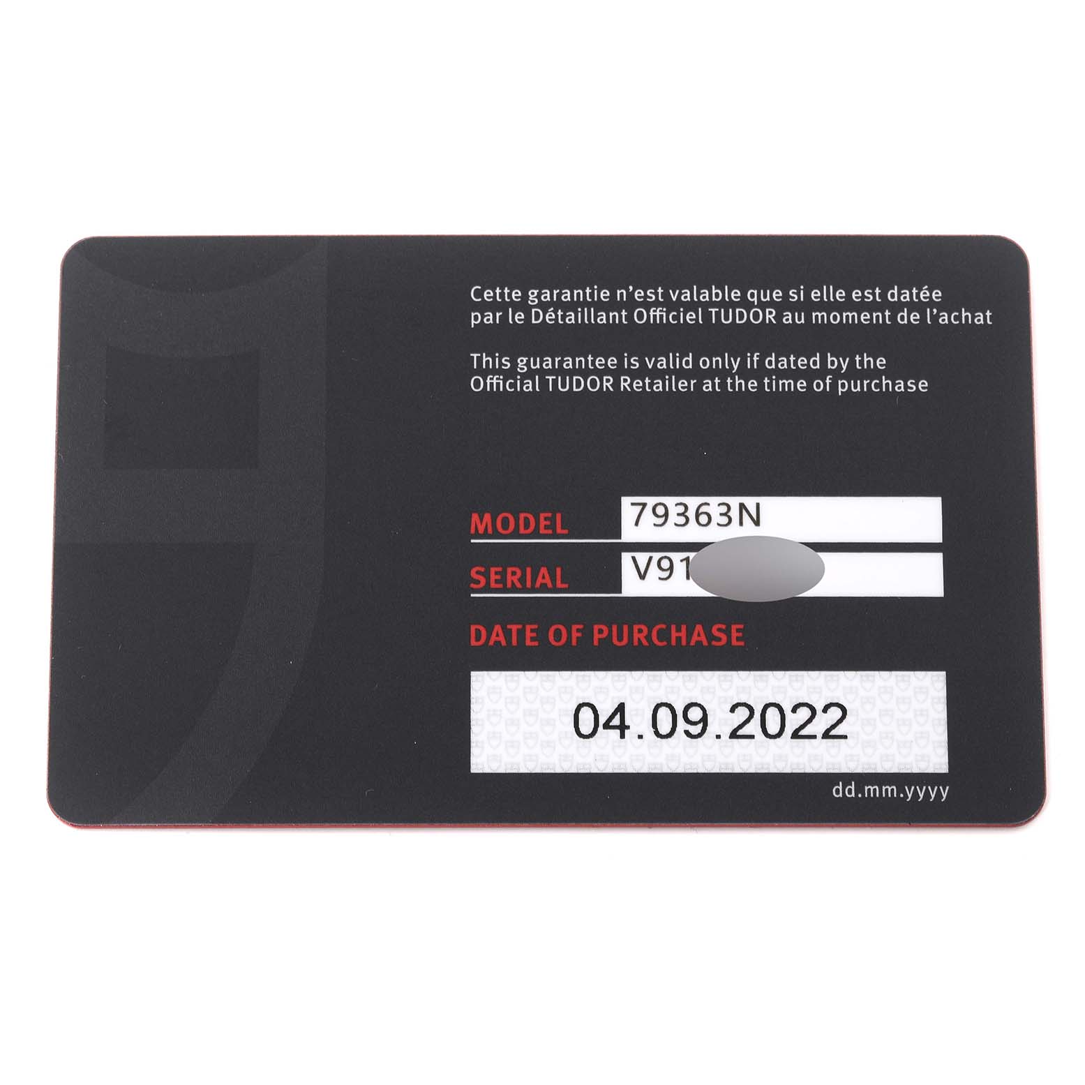 This image displays the warranty card for the Tudor Heritage Black Bay 79363N Men
s Steel and Gold (two tone) Black Dial 79363N Men
s Steel and Gold (two tone) Black Dial model 79363N, showing the serial number and date of purchase.