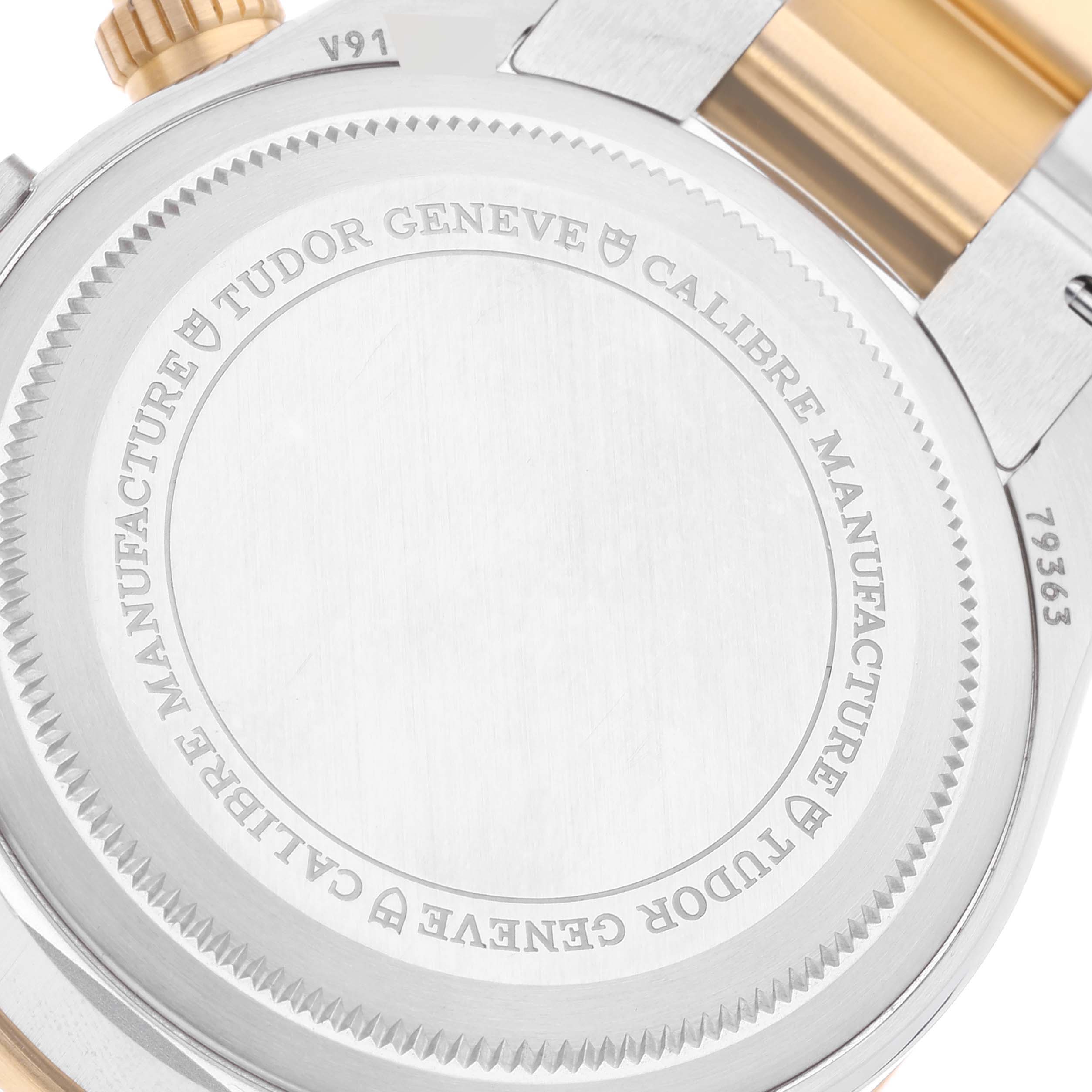 This image shows the case back of the Tudor Heritage Black Bay 79363N Men
s Steel and Gold (two tone) Black Dial 79363N Men
s Steel and Gold (two tone) Black Dial watch, featuring the brand
s engraving.