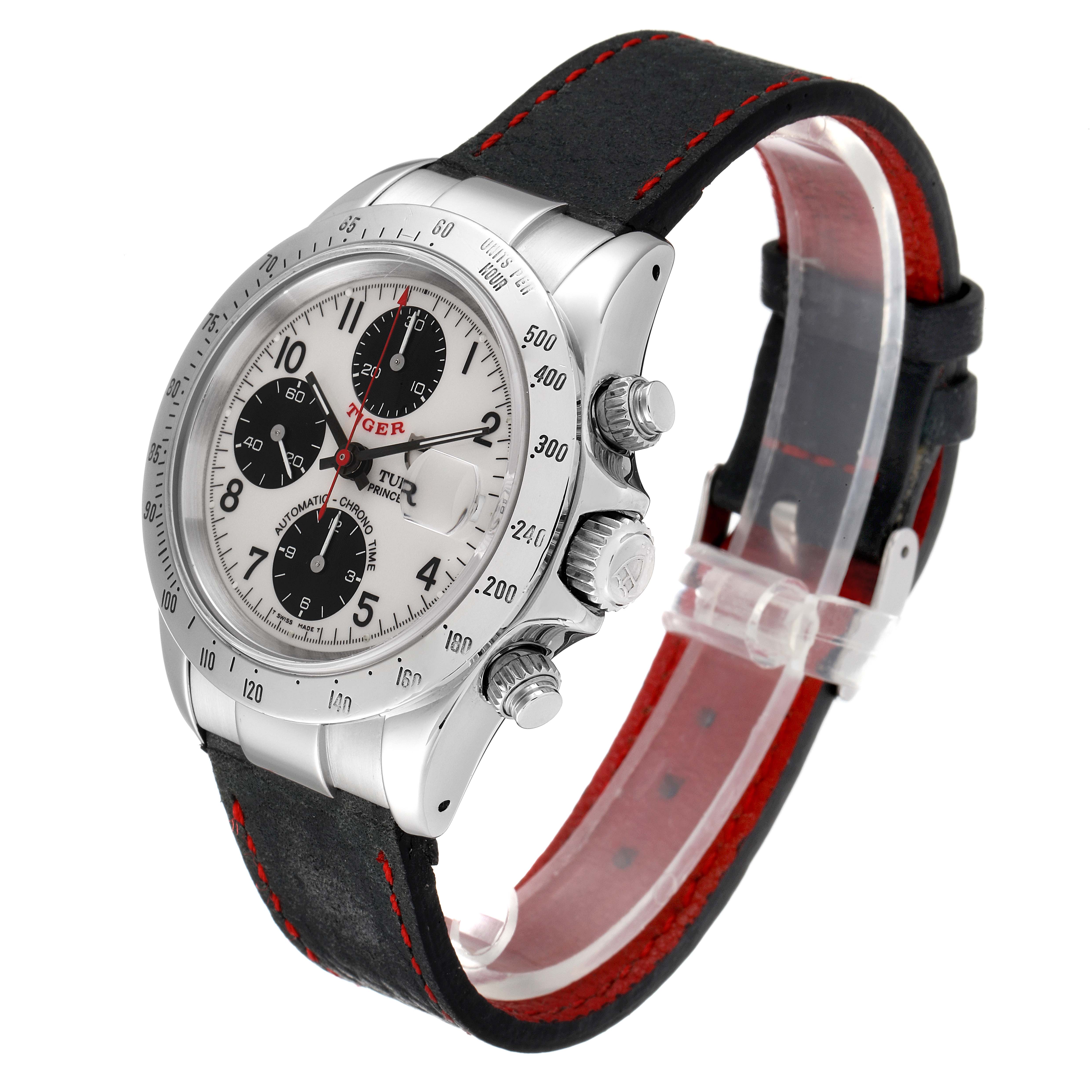 The image shows a Tudor Prince Tiger model watch at an angled side view, highlighting its dial, crown, pushers, and black-red strap.