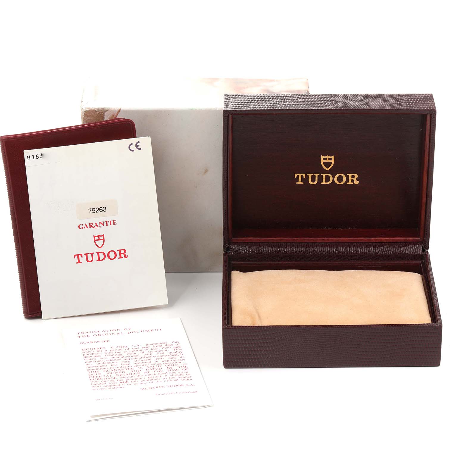 This image shows the packaging, warranty booklet, and documentation for the Tudor Tiger 79263 Men's Steel and Gold (two tone) White Dial 79263 Men's Steel and Gold (two tone) White Dial model watch.