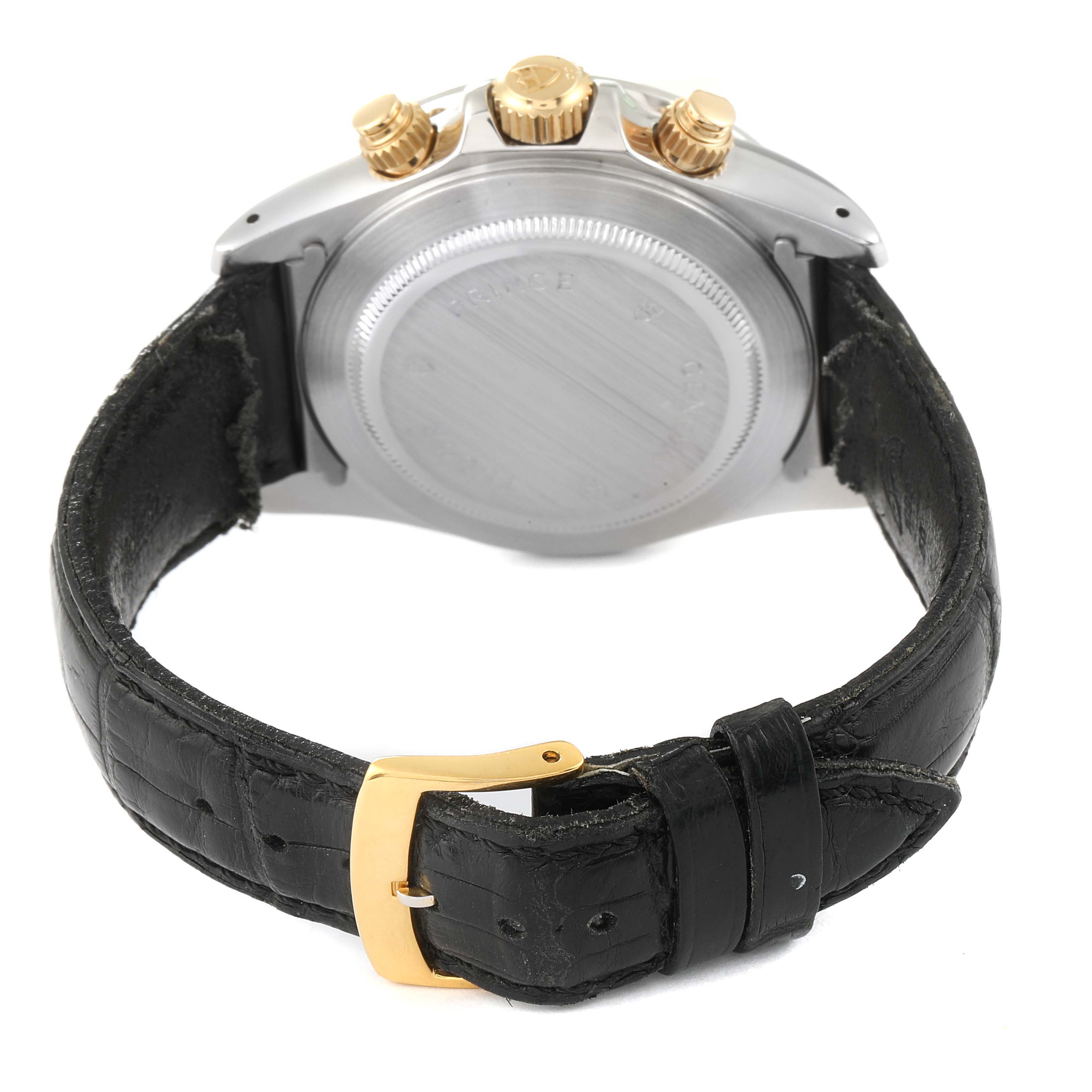 The image shows the back of a Tudor Tiger 79263 Men's Steel and Gold (two tone) White Dial 79263 Men's Steel and Gold (two tone) White Dial model watch, highlighting its case back, crown, chronograph pushers, and leather strap with a gold buckle.