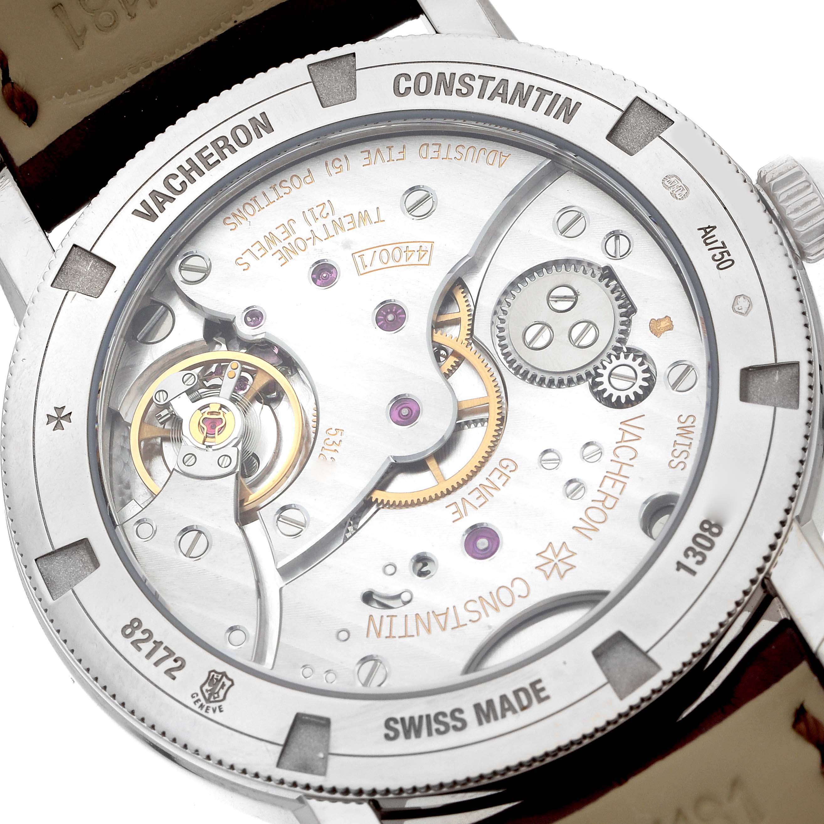 The image shows the back view of a Vacheron Constantin Traditionnelle 82172G Men's White Gold Silver Dial model, highlighting the intricate movement and engravings.