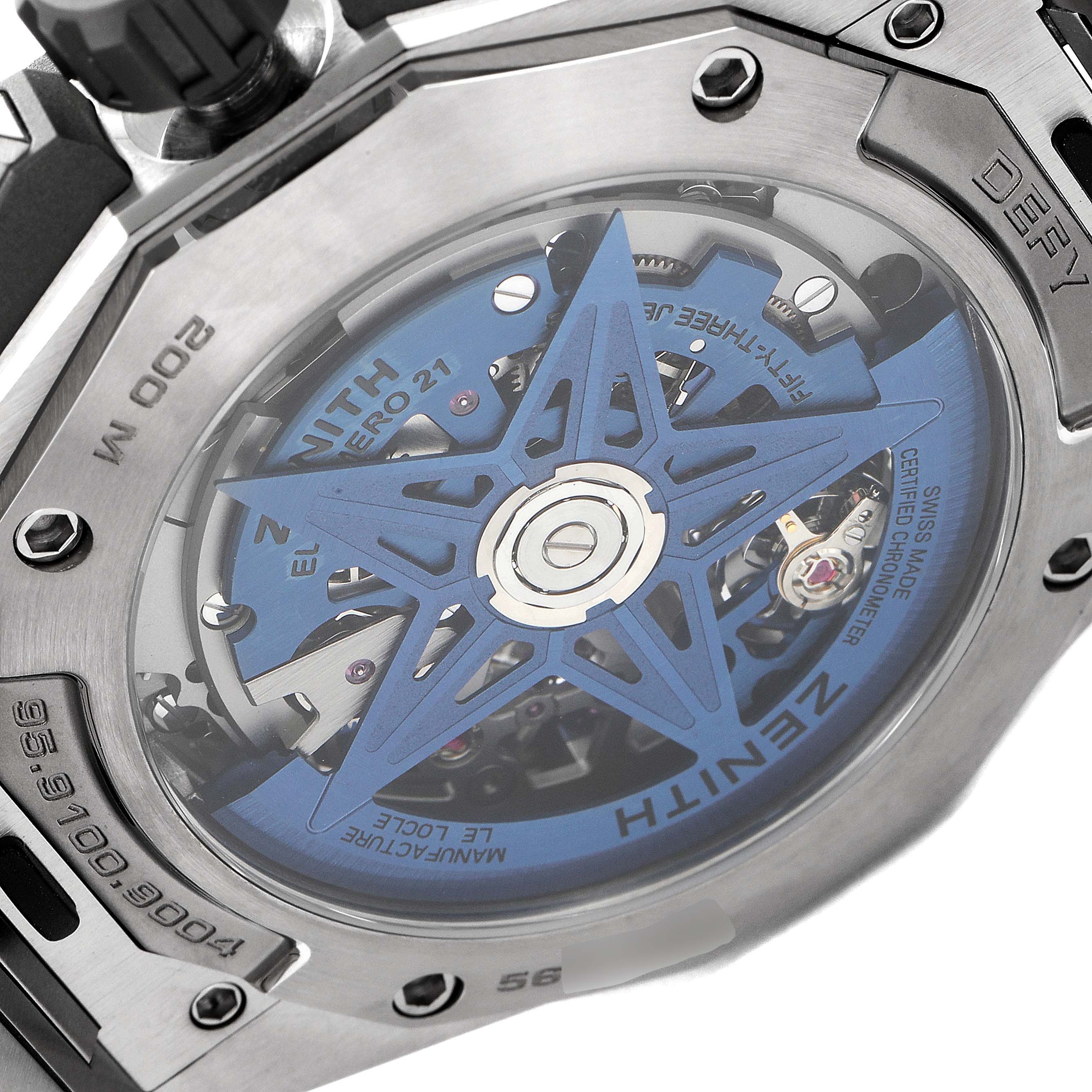 The image shows the back view of the Zenith Defy 95.9100.9004/01.I001 Men's Titanium Blue Dial 95.9100.9004/01.I001 Men's Titanium Blue Dial model watch, highlighting its intricate internal mechanism and rotor design.