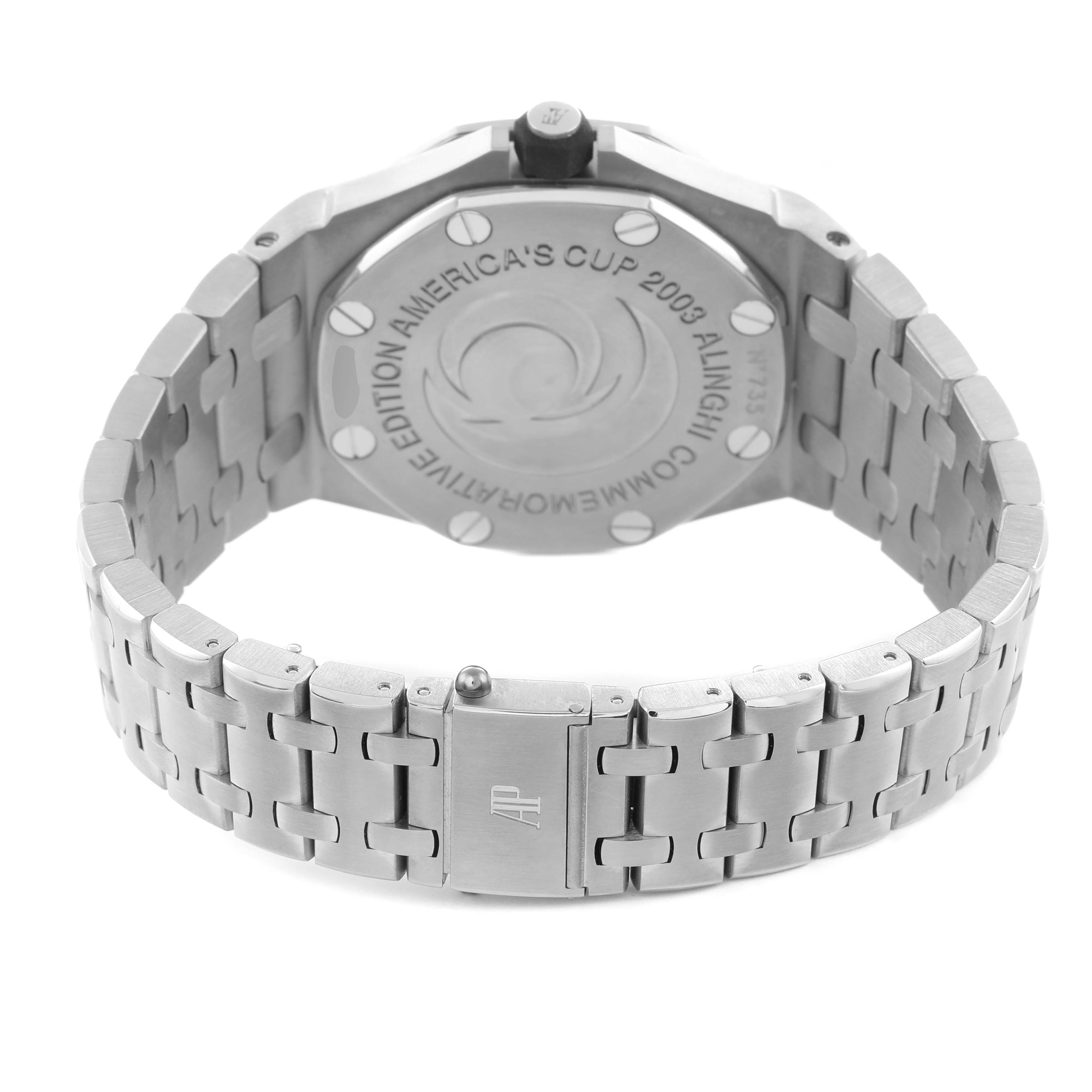 The image shows the back view of a Royal Oak by Audemars Piguet, highlighting the case back and stainless steel bracelet with clasp.