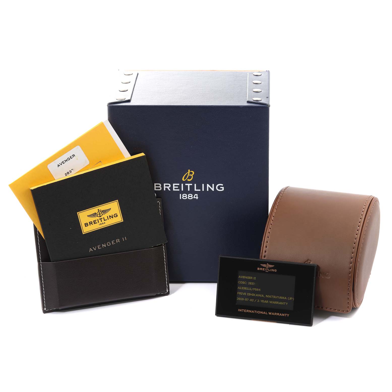 The image shows Breitling Avenger A13381 Men's Stainless Steel Grey Dial A13381 Men's Stainless Steel Grey Dial watch accessories, including the box, warranty card, and leather case at a slight front angle.