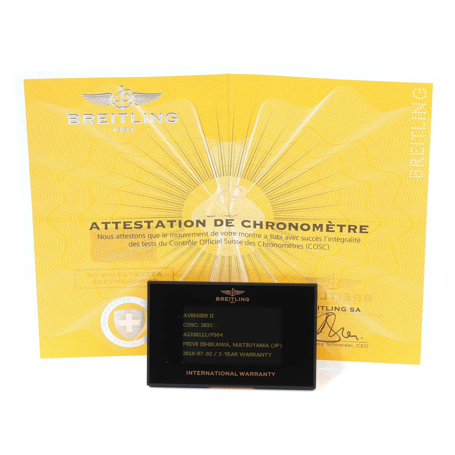 The image shows the certification and international warranty card for a Breitling Avenger A13381 Men's Stainless Steel Grey Dial A13381 Men's Stainless Steel Grey Dial II watch.