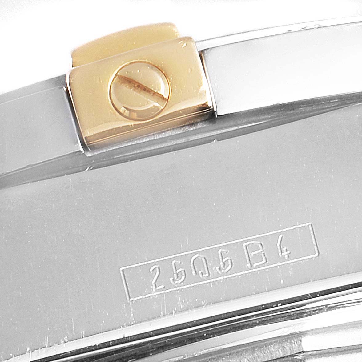 The image shows a close-up view of the back casing and part of the clasp of the Breitling B71356 Women's Steel and Gold (two tone) Silver Dial B71356 Women's Steel and Gold (two tone) Silver Dial Cockpit Steel Yellow Gold Diamond Ladies Watch B71356.