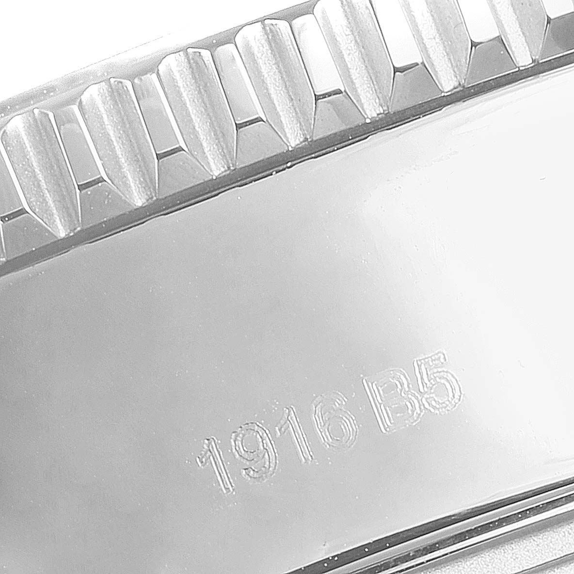 This image shows a close-up of the bezel and engraved serial number "1916 B5" of the Breitling Superocean A13311 Men's Stainless Steel Blue Dial A13311 Men's Stainless Steel Blue Dial watch.
