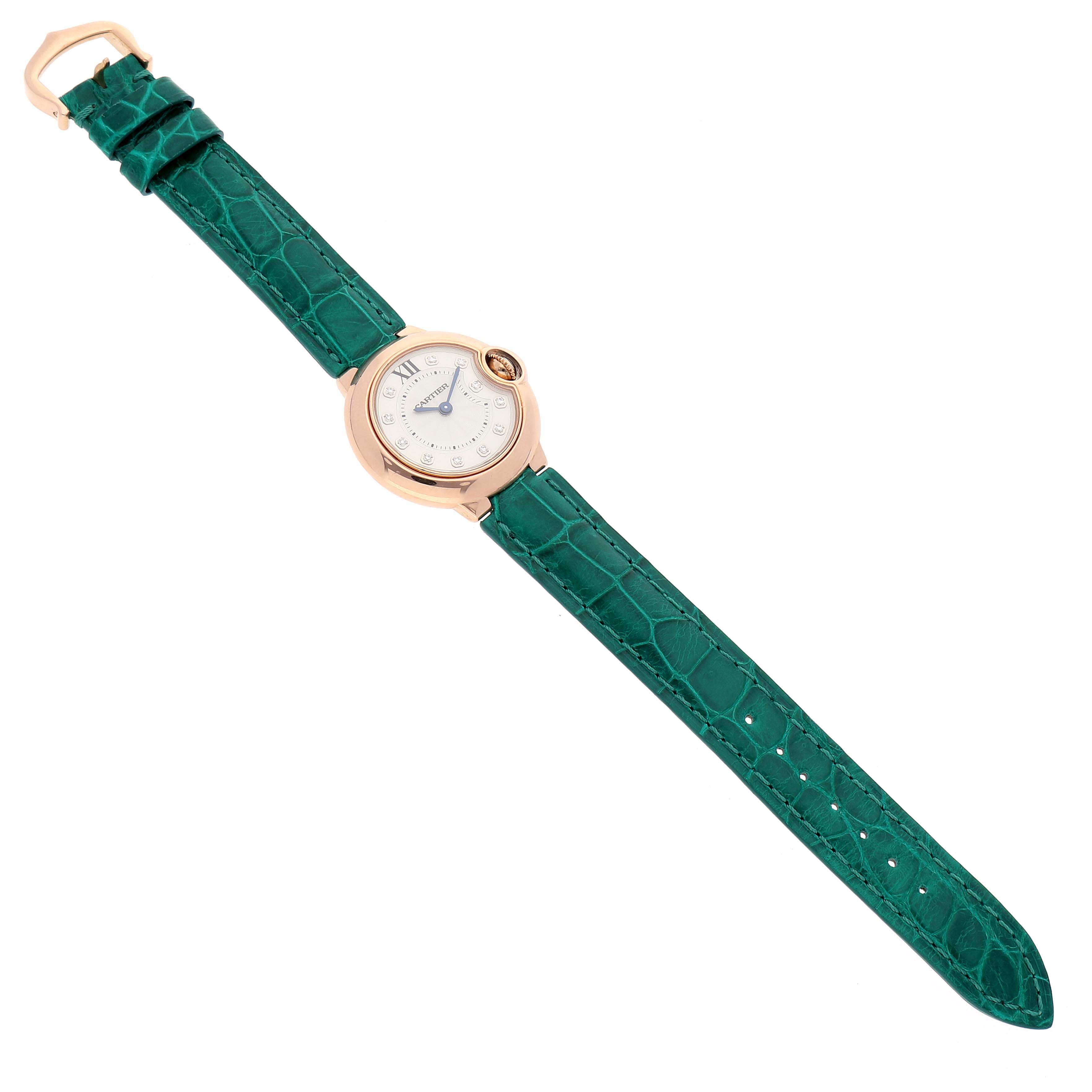 This image shows a Cartier Ballon Bleu WE902050 Women's Rose Gold Silver Dial WE902050 Women's Rose Gold Silver Dial watch with a green leather strap, seen from a top-down angle.