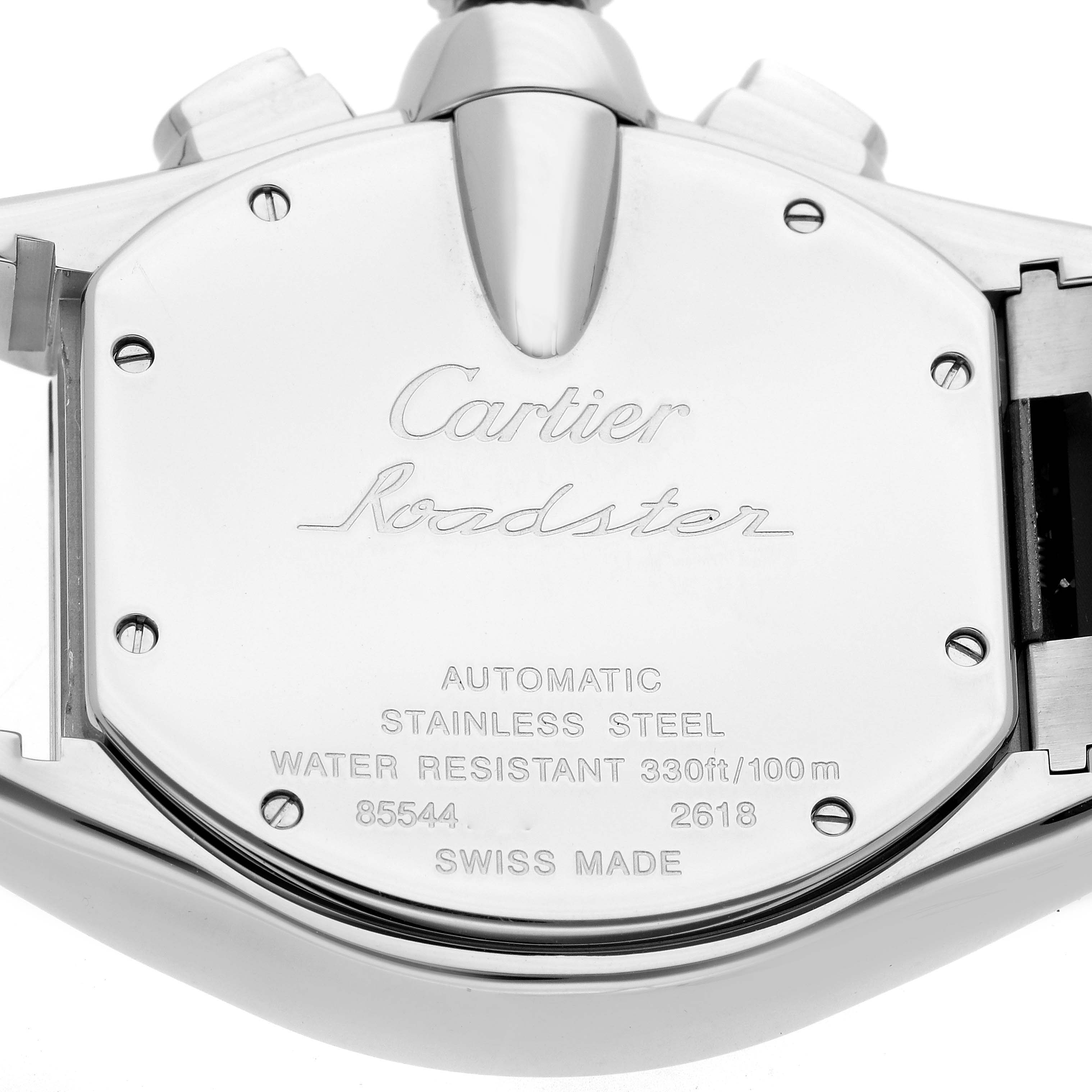 The image shows the back case of a Cartier Roadster W62020X6 Men's Stainless Steel Black Dial watch, displaying brand engravings and water resistance details.