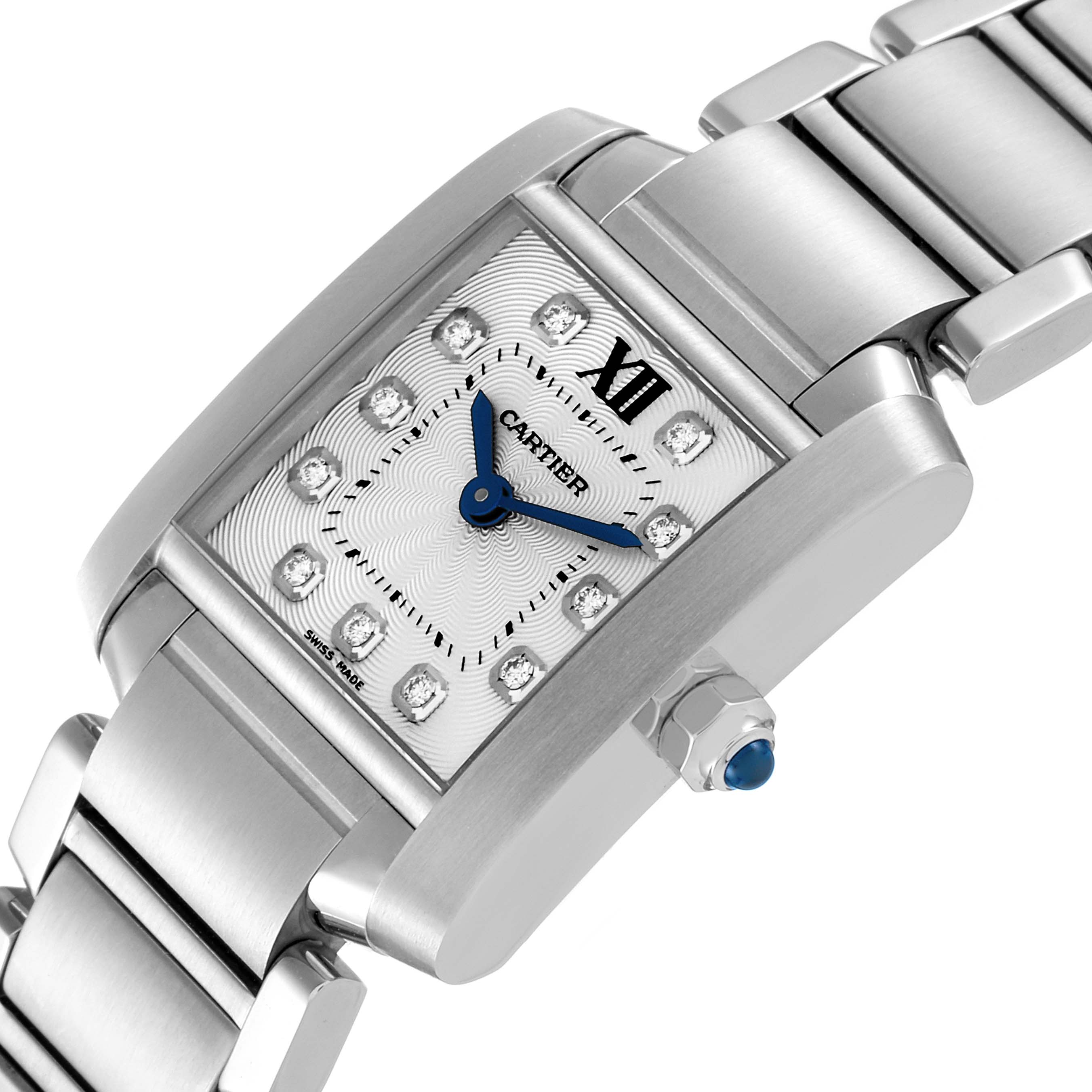 The image shows a close-up of the Cartier Tank Française watch, highlighting its rectangular face, diamond hour markers, and blue hands at an angled view.