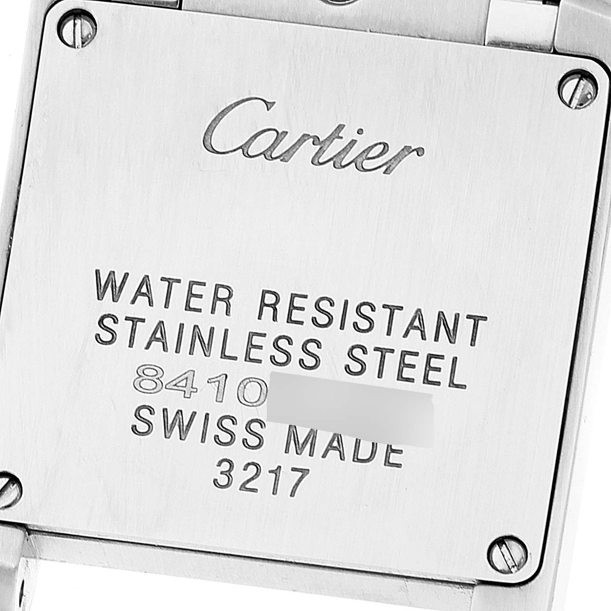 The image shows the stainless steel back of a Cartier Tank Francaise WE110006 Women's Stainless Steel Silver Dial WE110006 Women's Stainless Steel Silver Dial watch with engraved specifications.