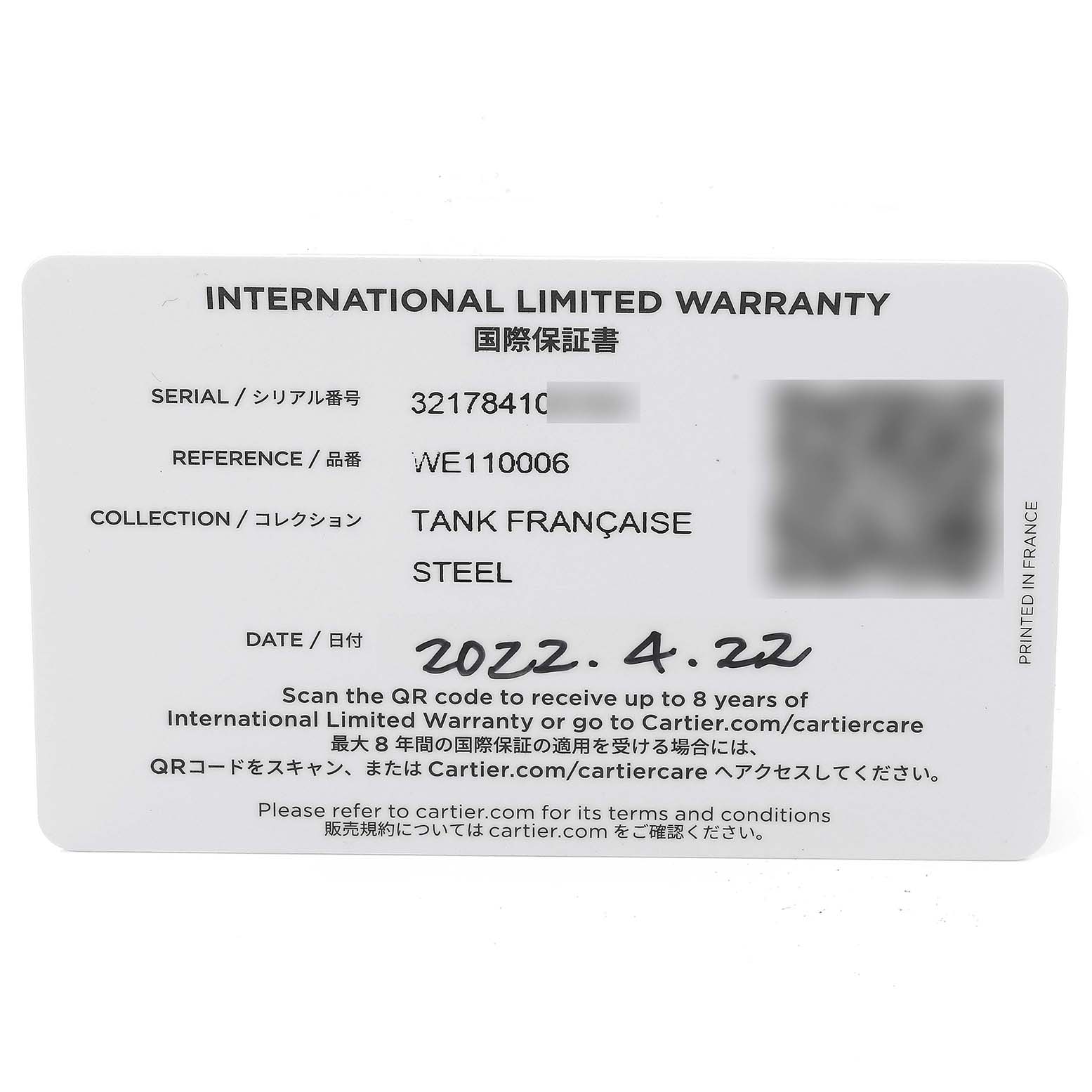 This is an international limited warranty card for the Tank Francaise model by Cartier, shown from a top-down angle.
