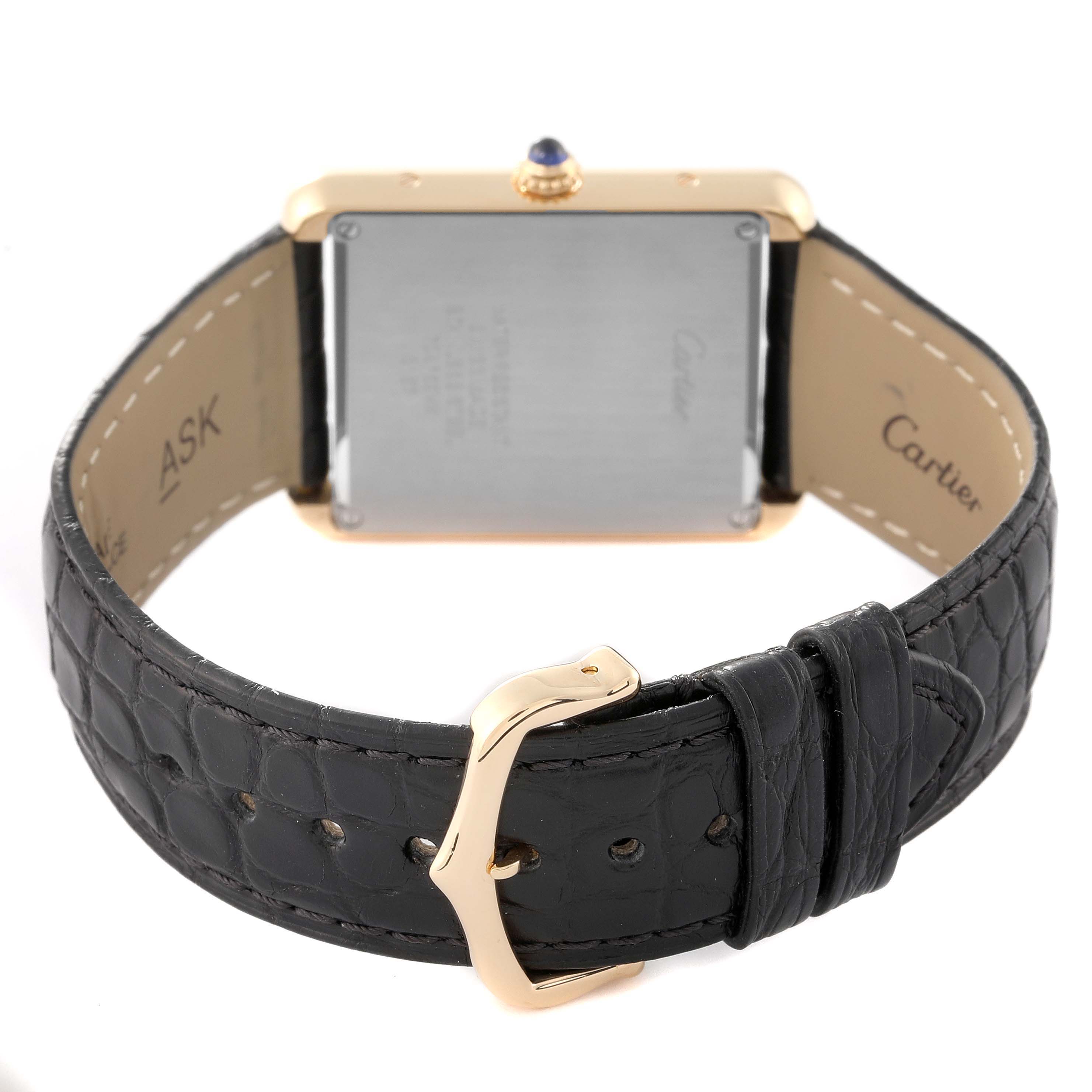 The image shows the back case and leather strap of a Cartier Tank Solo W5200004 Men's Steel and Gold (two tone) Silver Dial W5200004 Men's Steel and Gold (two tone) Silver Dial watch.