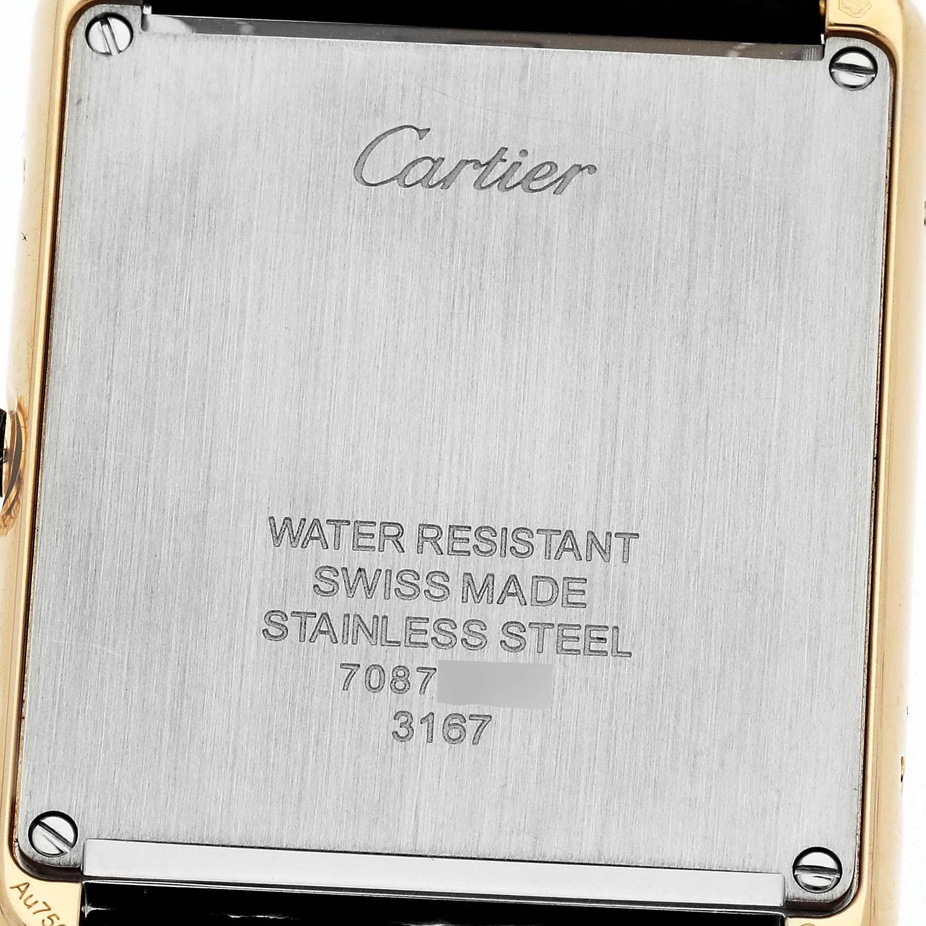 This is the back case of the Cartier Tank Solo W5200004 Men's Steel and Gold (two tone) Silver Dial W5200004 Men's Steel and Gold (two tone) Silver Dial watch, showing the brand, model details, and material information.