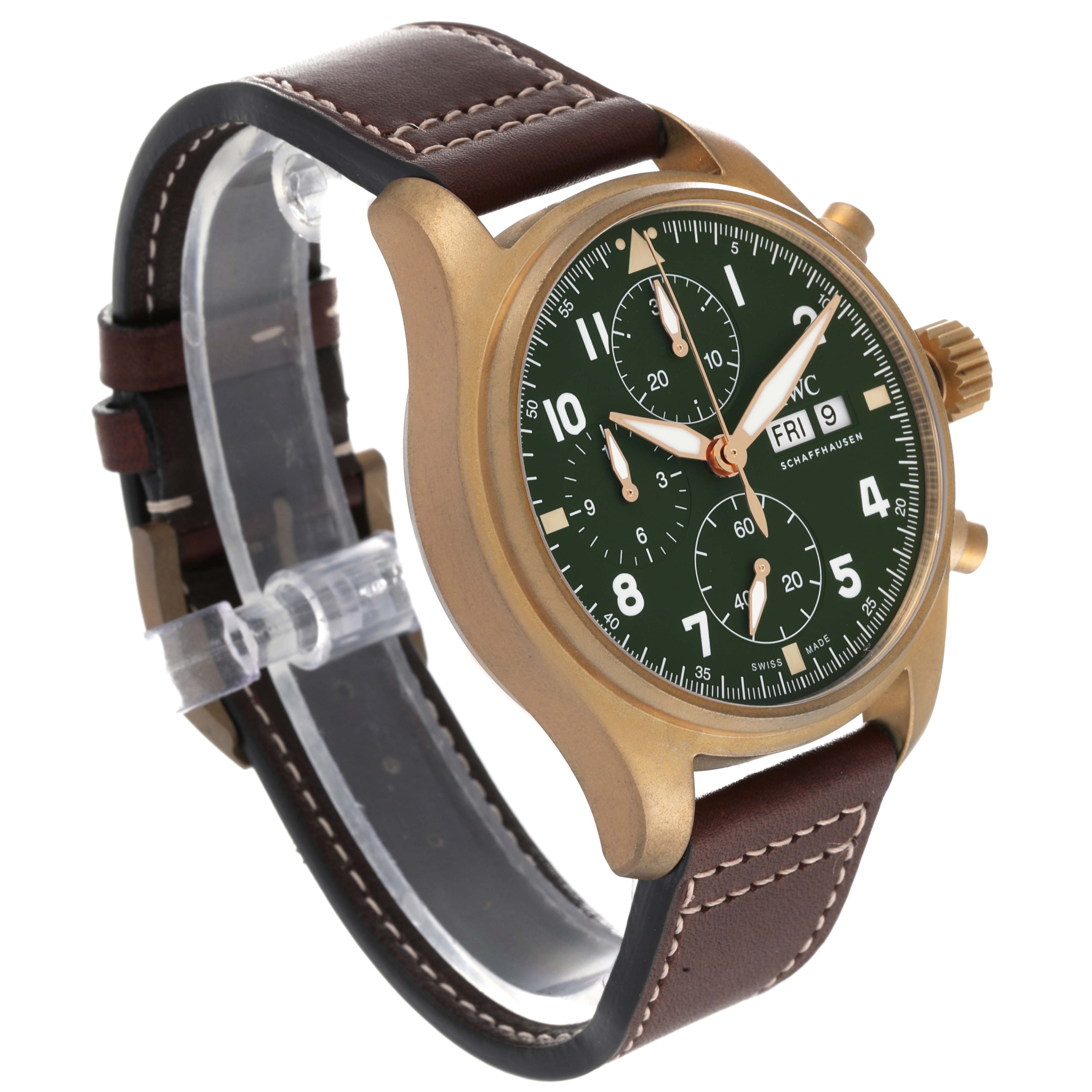 This image shows an IWC Pilot IW387902 Men's Bronze Green Dial IW387902 Men's Bronze Green Dial model watch at a quarter angle, highlighting the green dial, chronograph, brown leather strap, and brass case.