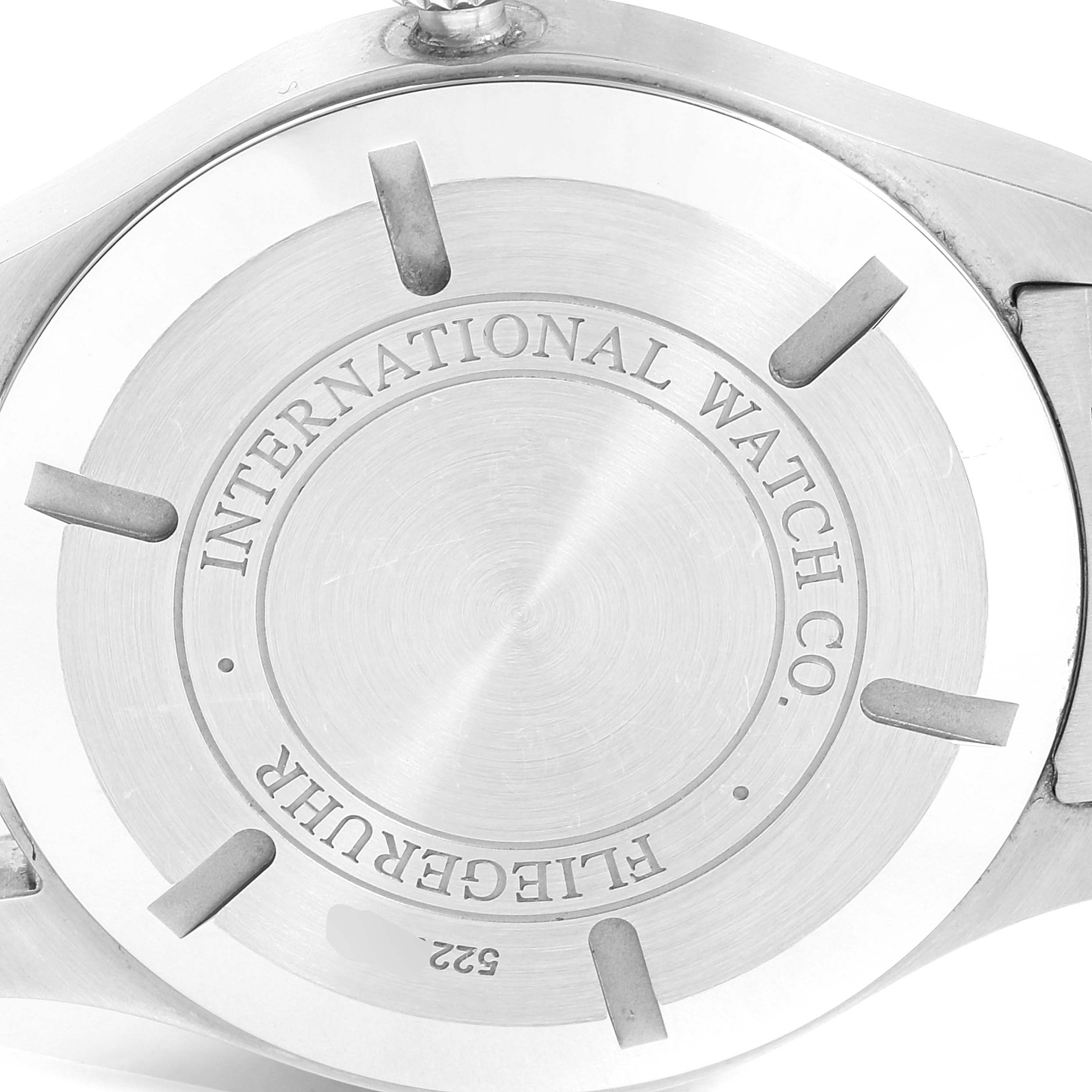 The image shows the back case of an IWC Pilot IW326504 Men's Stainless Steel Black Dial IW326504 Men's Stainless Steel Black Dial model watch.