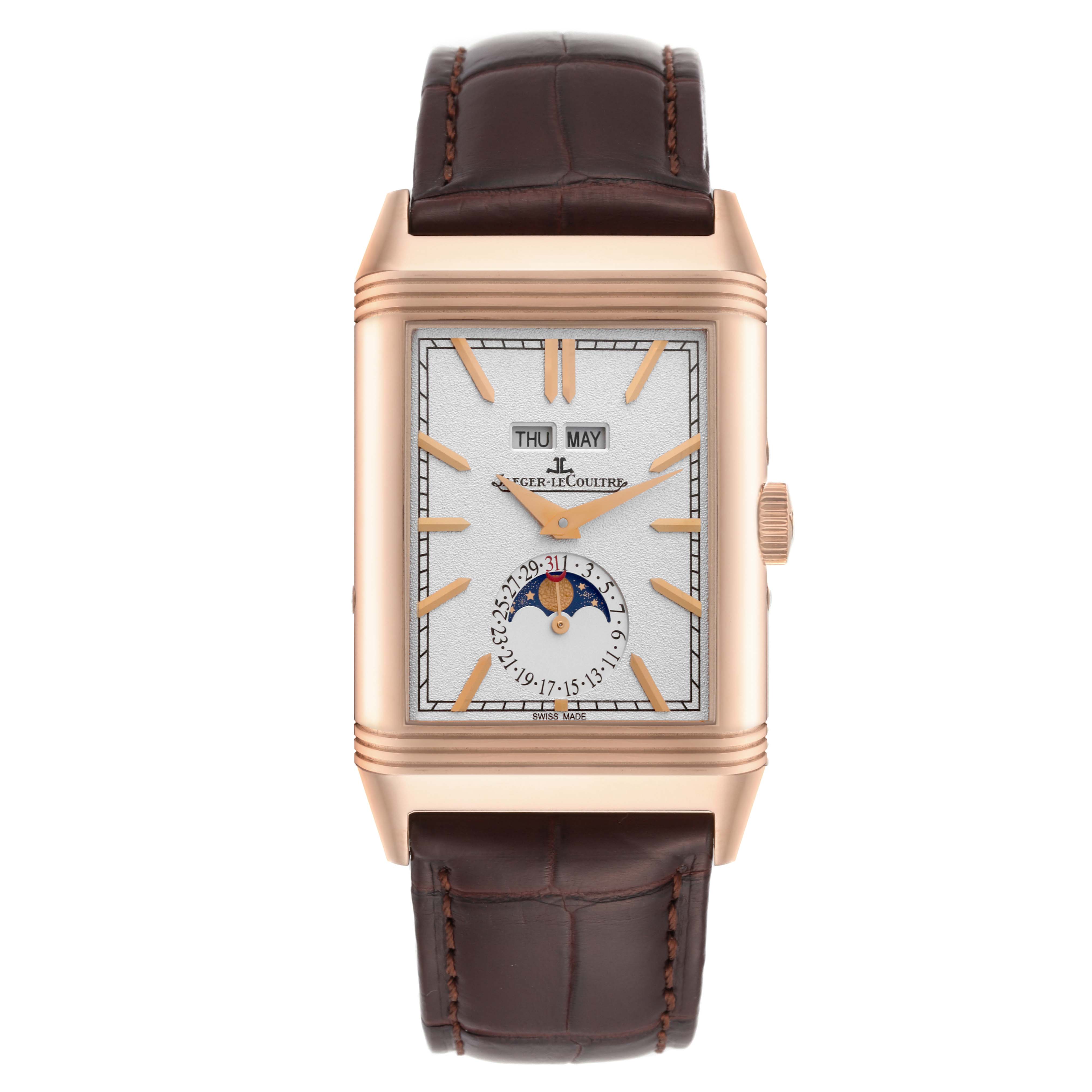 The image shows a frontal view of the Jaeger-LeCoultre Reverso watch, displaying the face, crown, and leather strap.