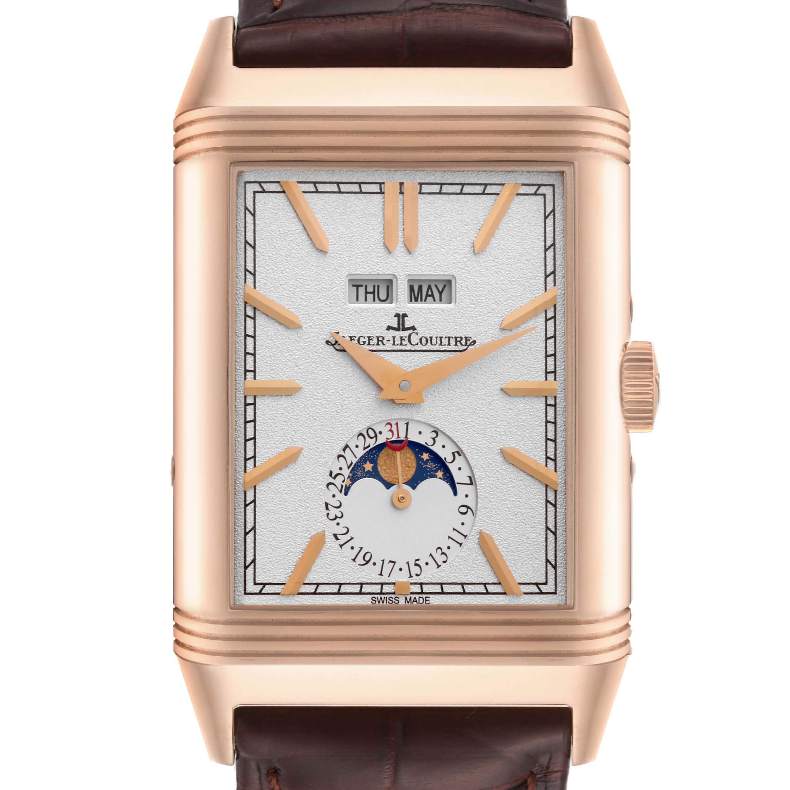 The image shows a front view of a Jaeger-LeCoultre Reverso watch, highlighting its dial, day/date display, and moon phase indicator.