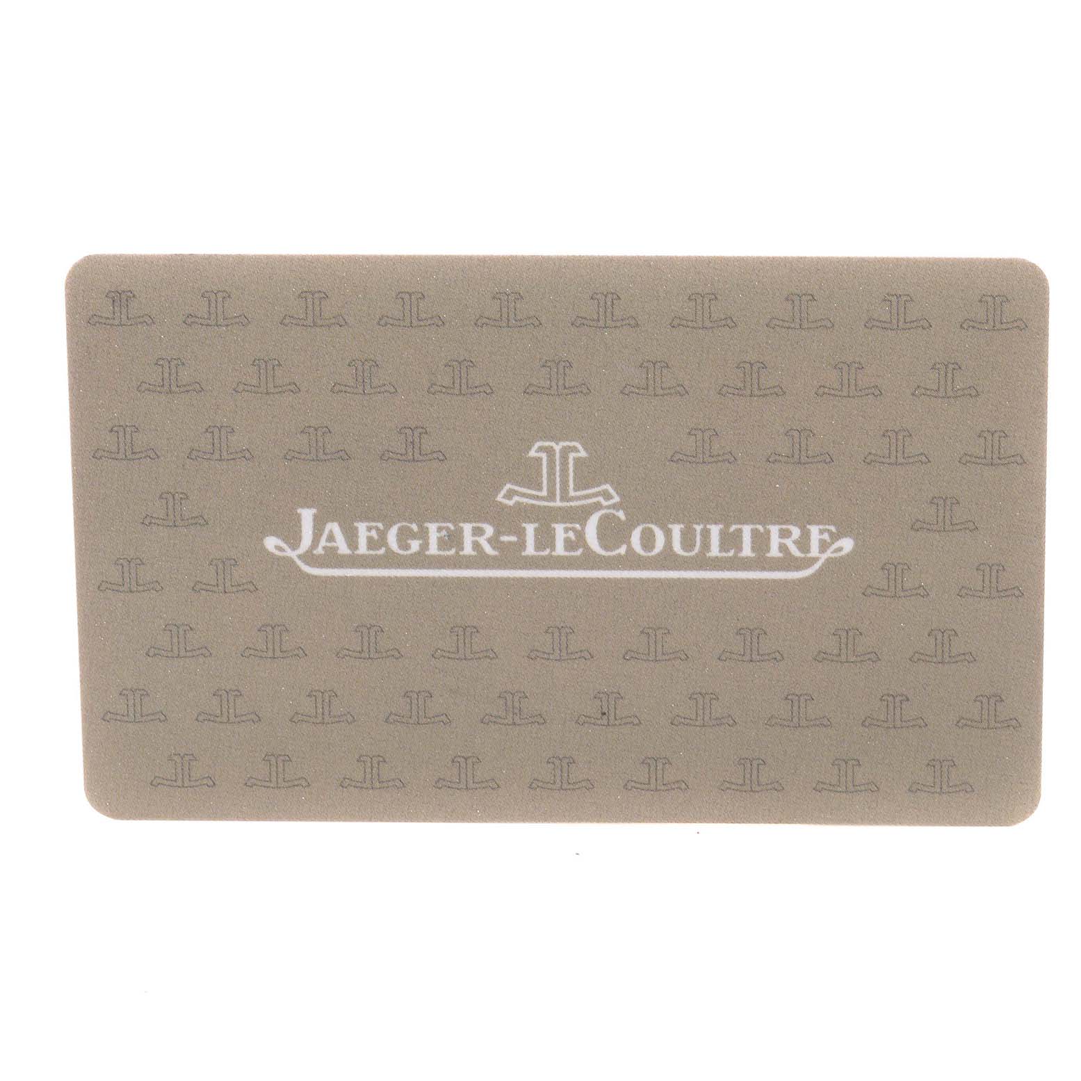 This image shows a Jaeger-LeCoultre warranty card with a beige background and repeating logo pattern.