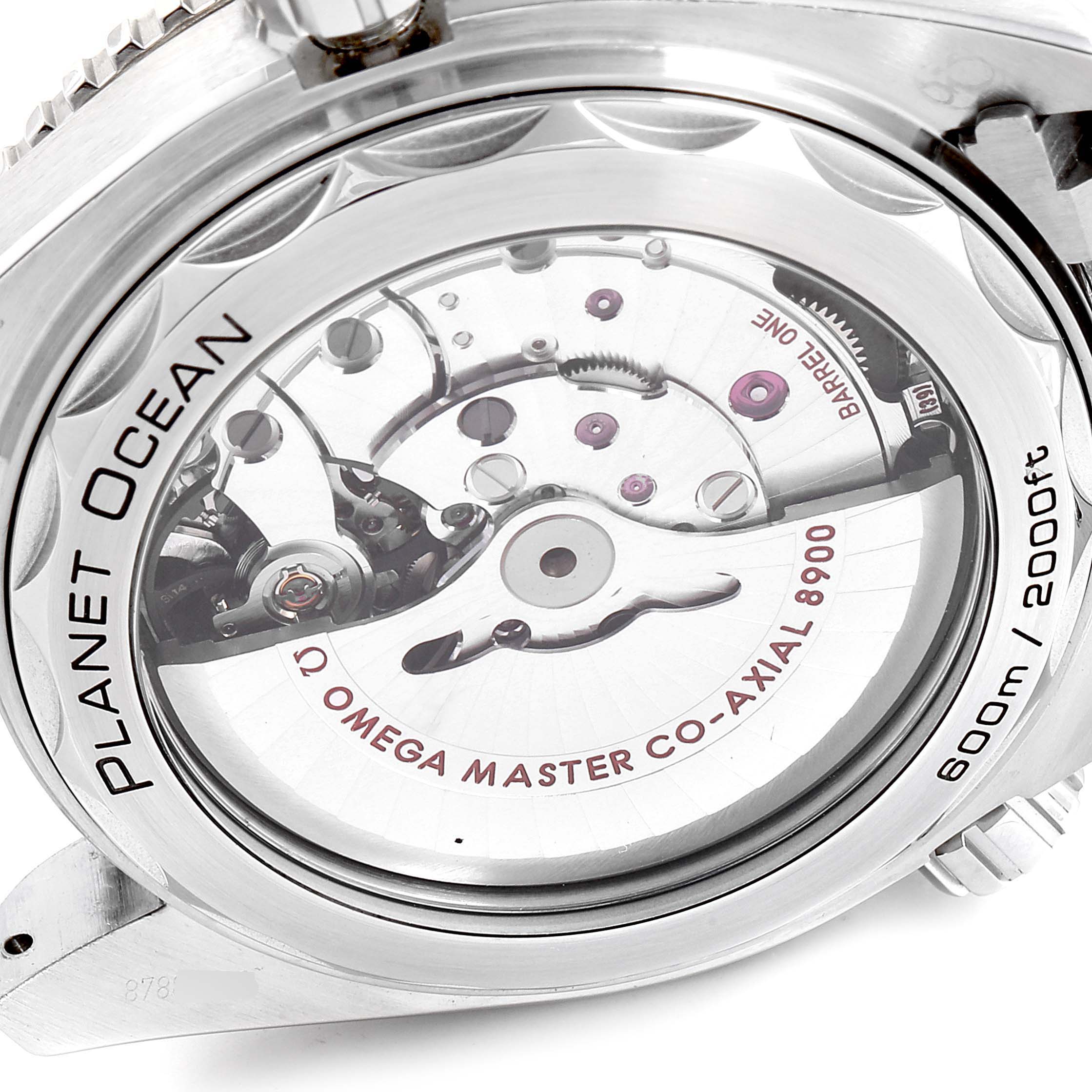 The image shows the back of the Omega Planet Ocean 215.30.44.21.01.001 Men's Stainless Steel Black Dial 215.30.44.21.01.001 Men's Stainless Steel Black Dial watch, highlighting its movement and internal mechanics.