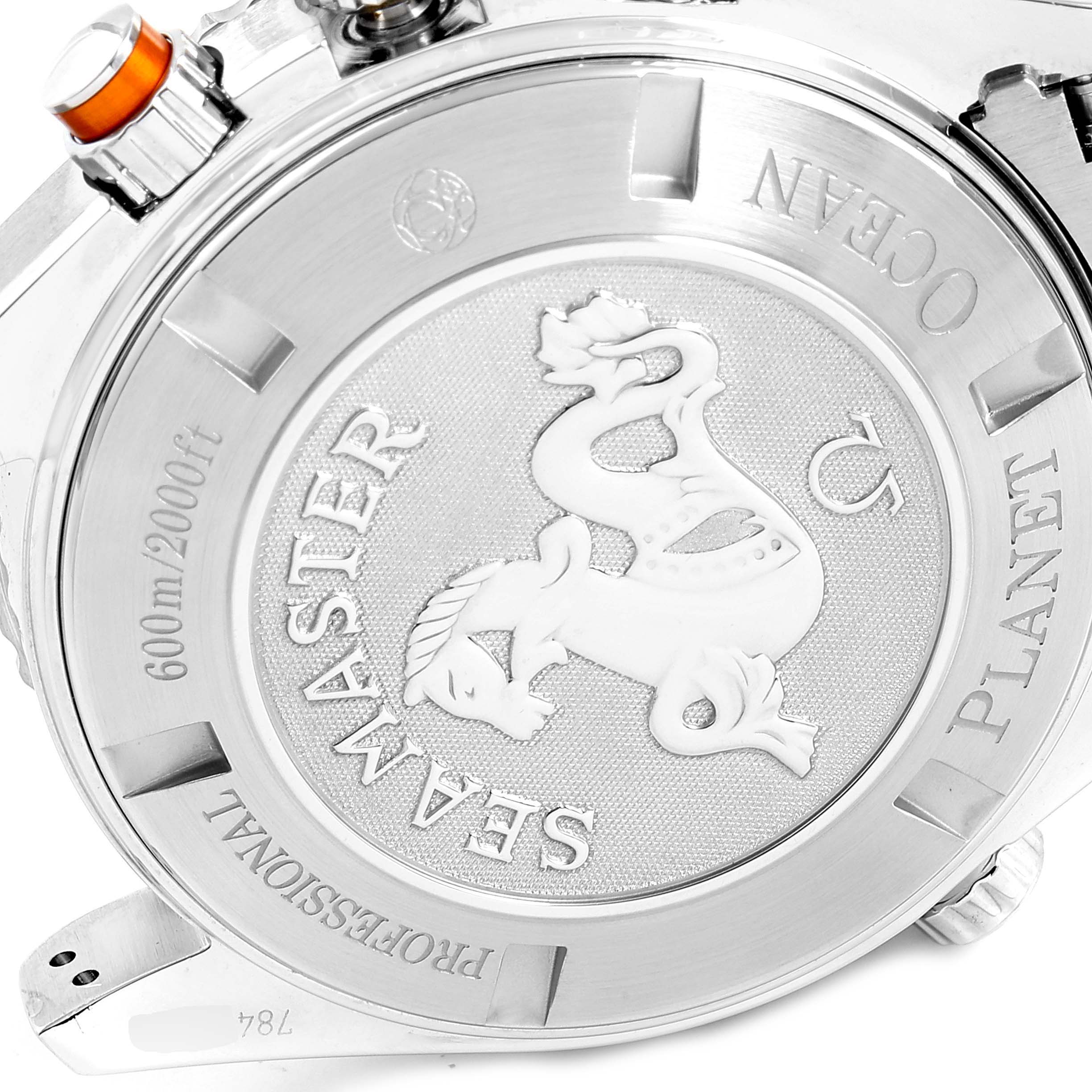 The image shows the back case and crown of the Omega Planet Ocean 2218.50.00 Men's Stainless Steel Black Dial 2218.50.00 Men's Stainless Steel Black Dial Seamaster watch, highlighting its intricate engravings and branding.