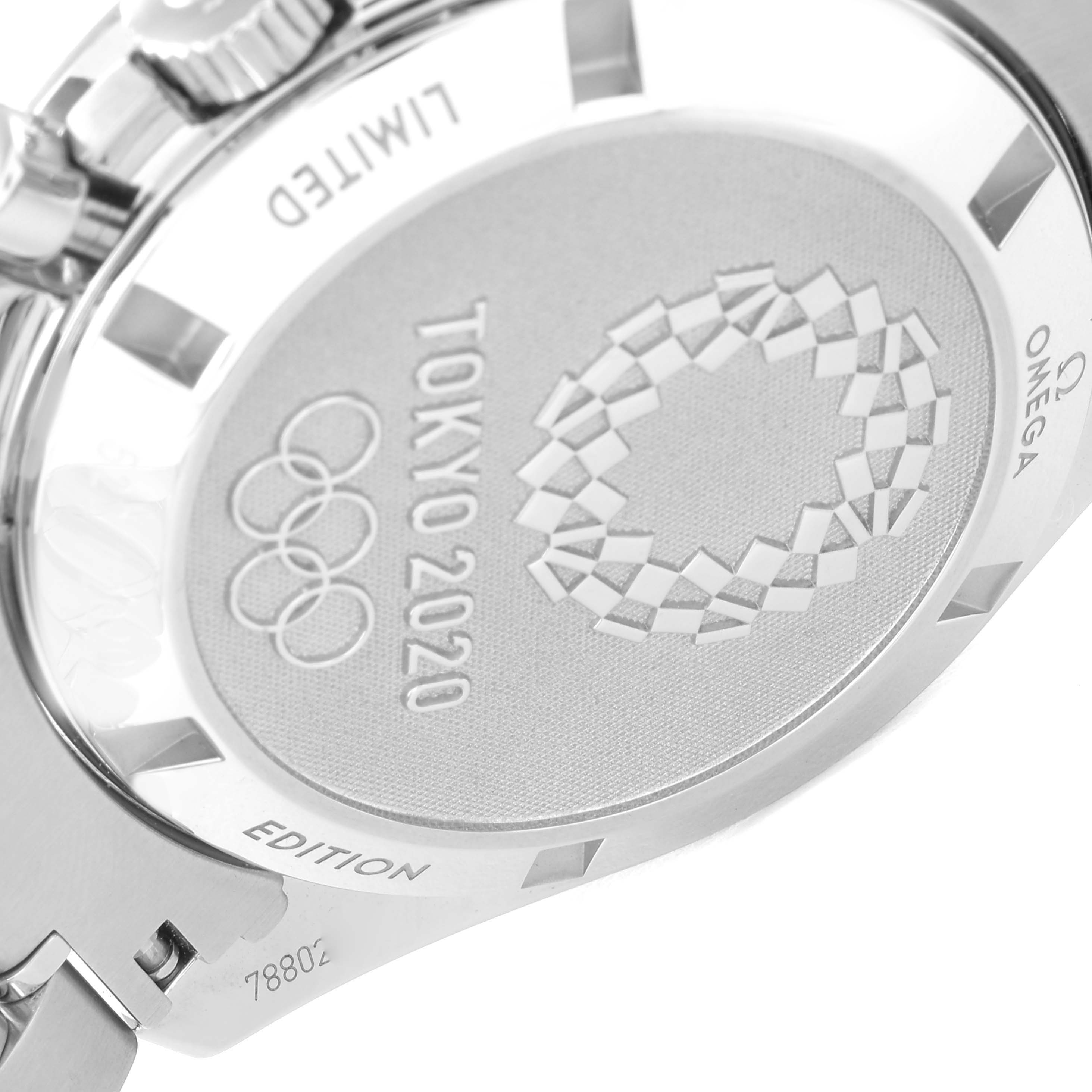 The image shows the case back of the Omega Speedmaster 522.30.42.30.04.001 Men's Stainless Steel White Dial 522.30.42.30.04.001 Men's Stainless Steel White Dial, featuring the Tokyo 2020 Olympics engraving.