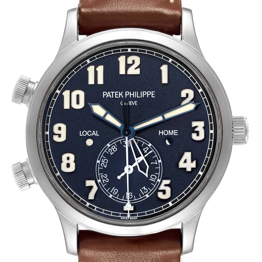 The Patek Philippe Calatrava 5524G Men's White Gold Blue Dial model is shown from a front angle, displaying its face, hands, and crown on a leather strap.