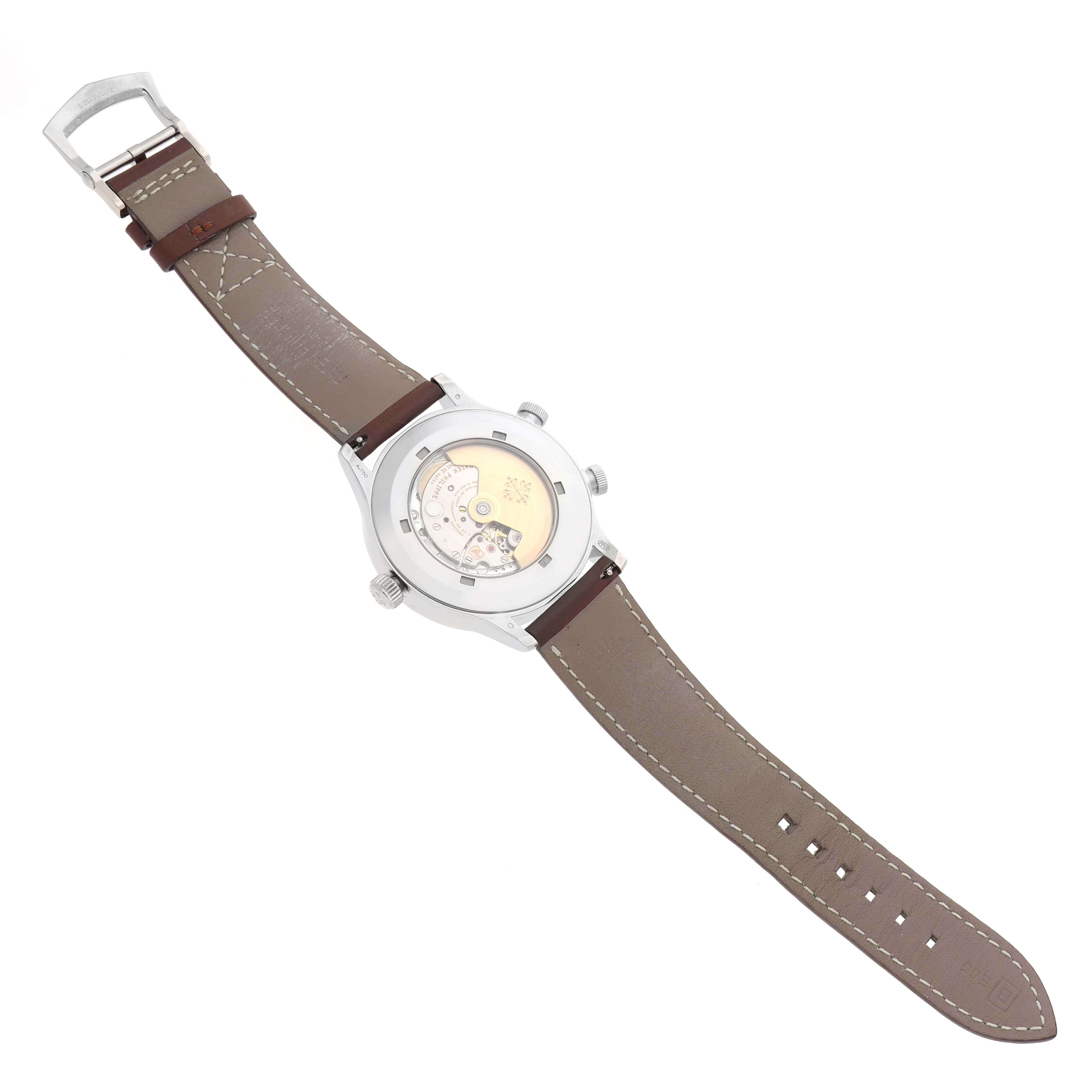 The image shows the back of the Patek Philippe Calatrava 5524G Men's White Gold Blue Dial watch, highlighting its movement and brown leather strap.