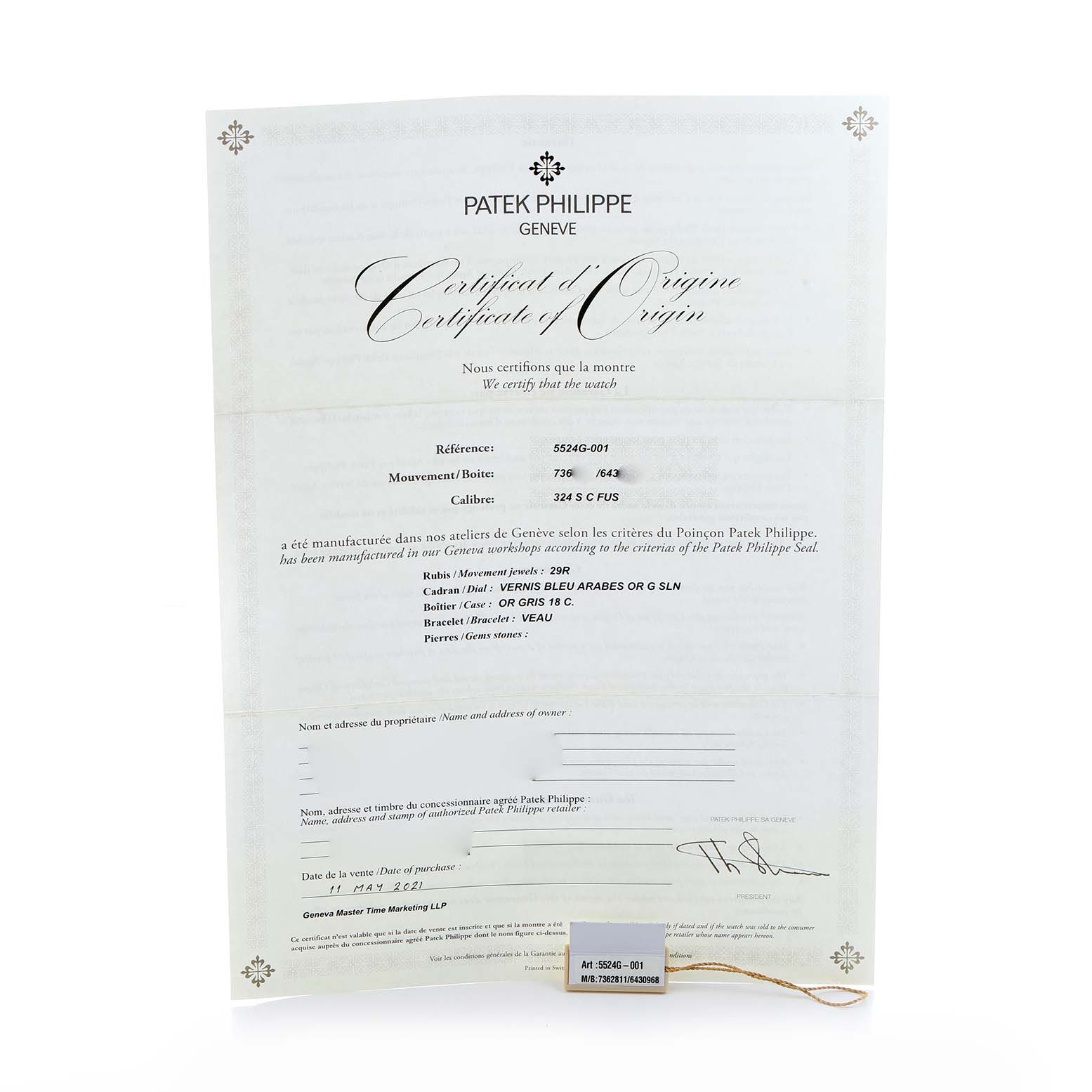 The image shows the Certificate of Origin for a Patek Philippe Calatrava 5524G Men's White Gold Blue Dial model, viewed from a front angle.