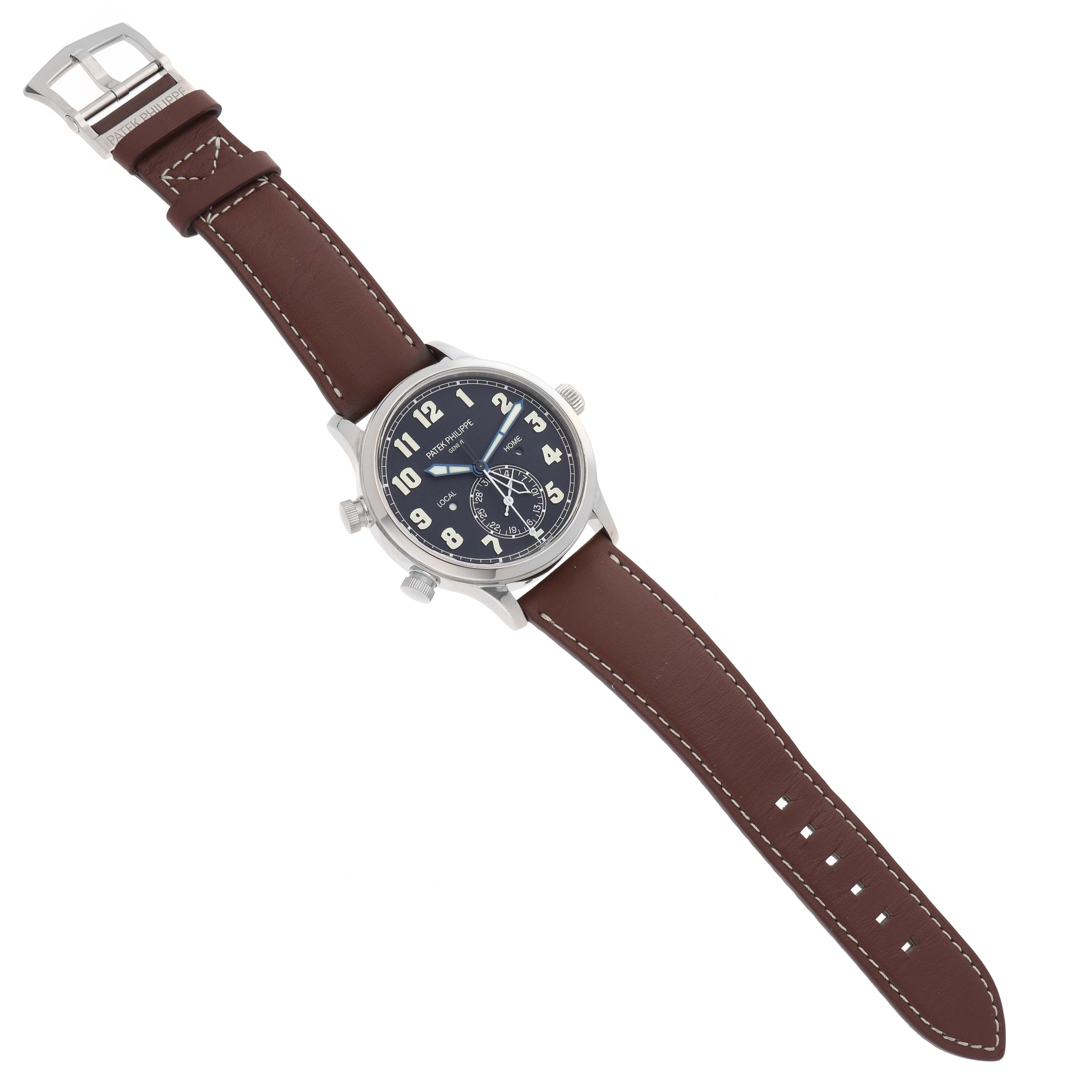 The Patek Philippe Calatrava 5524G Men's White Gold Blue Dial watch is shown at an angled view, featuring the face, case, crown, pushers, and full leather strap.