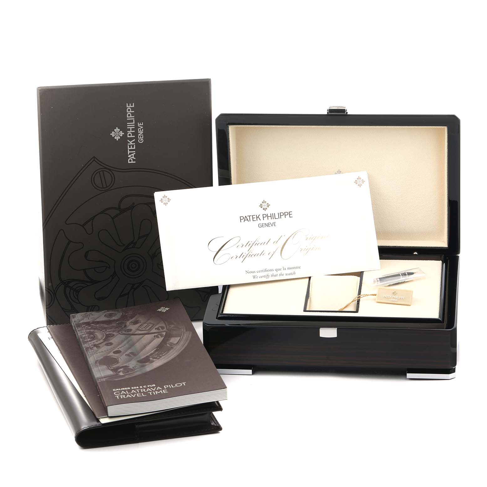The image shows a Patek Philippe Calatrava 5524G Men's White Gold Blue Dial box set with documents, certificate, and packaging viewed from the front.
