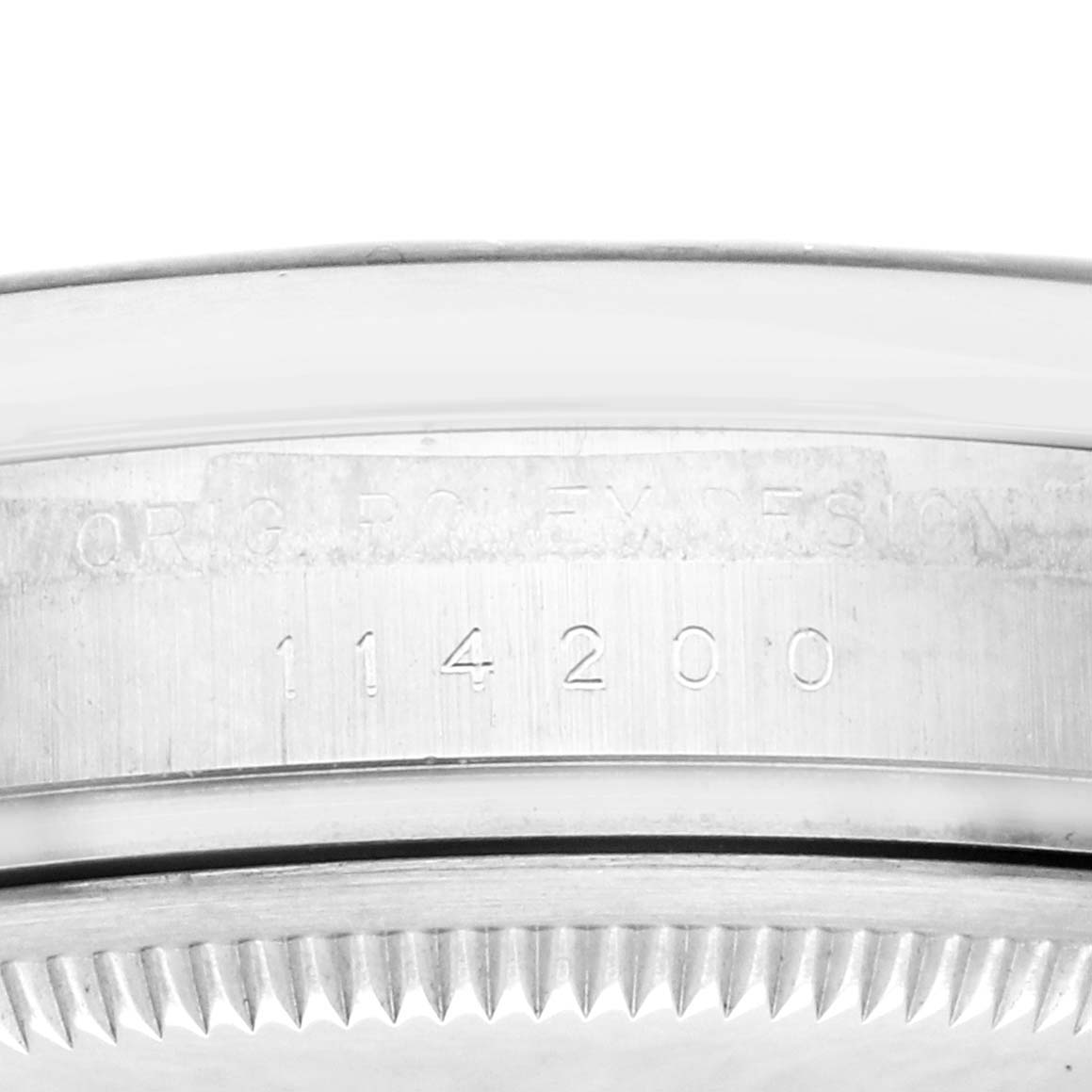 The image shows the side of a Rolex Air-King 114200 Men's Stainless Steel Blue Dial watch focusing on the case's edge with visible serial number engraving.