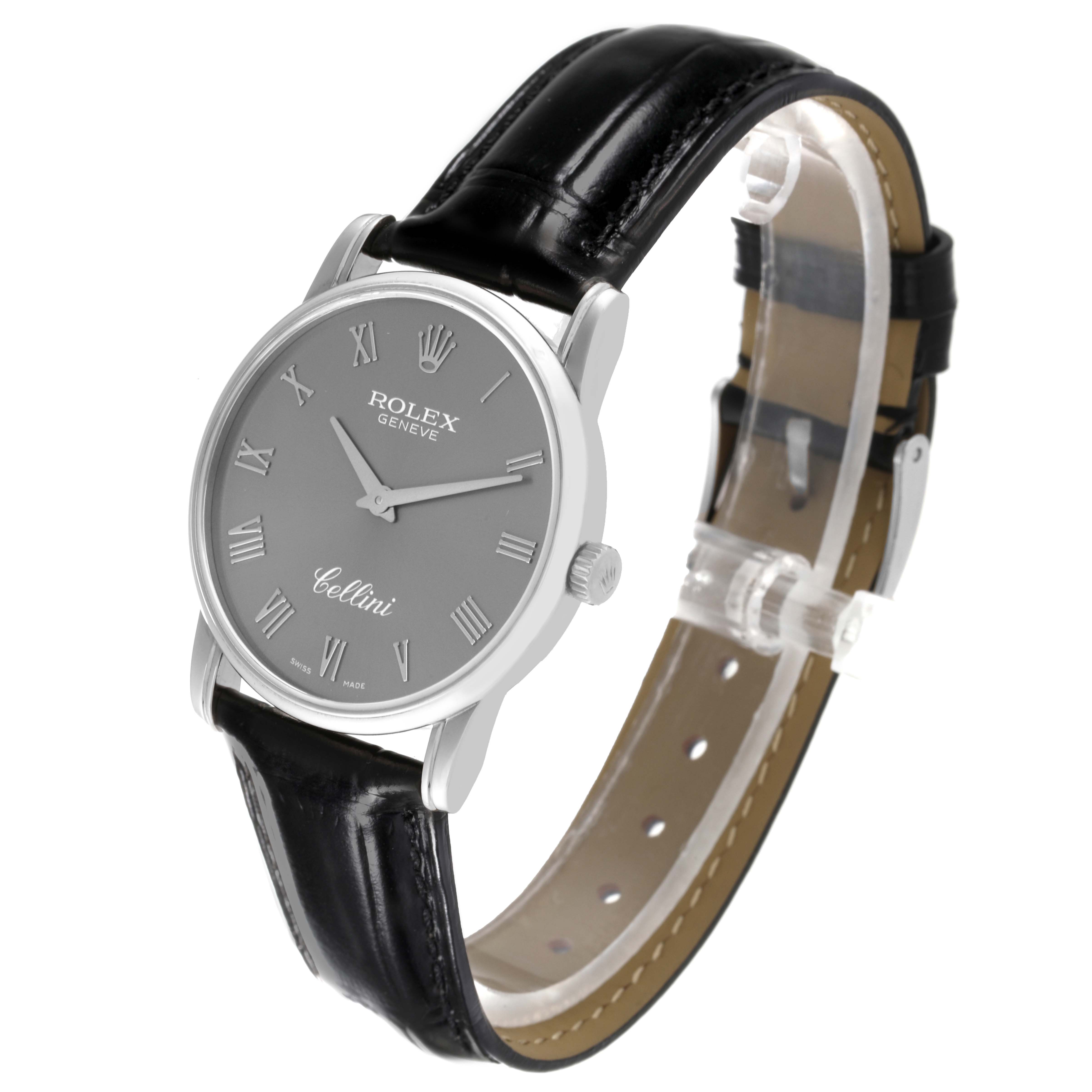 This Rolex Cellini 5116 Men's White Gold Grey Dial 5116 Men's White Gold Grey Dial watch is shown at an angled view, displaying its face and black leather strap.