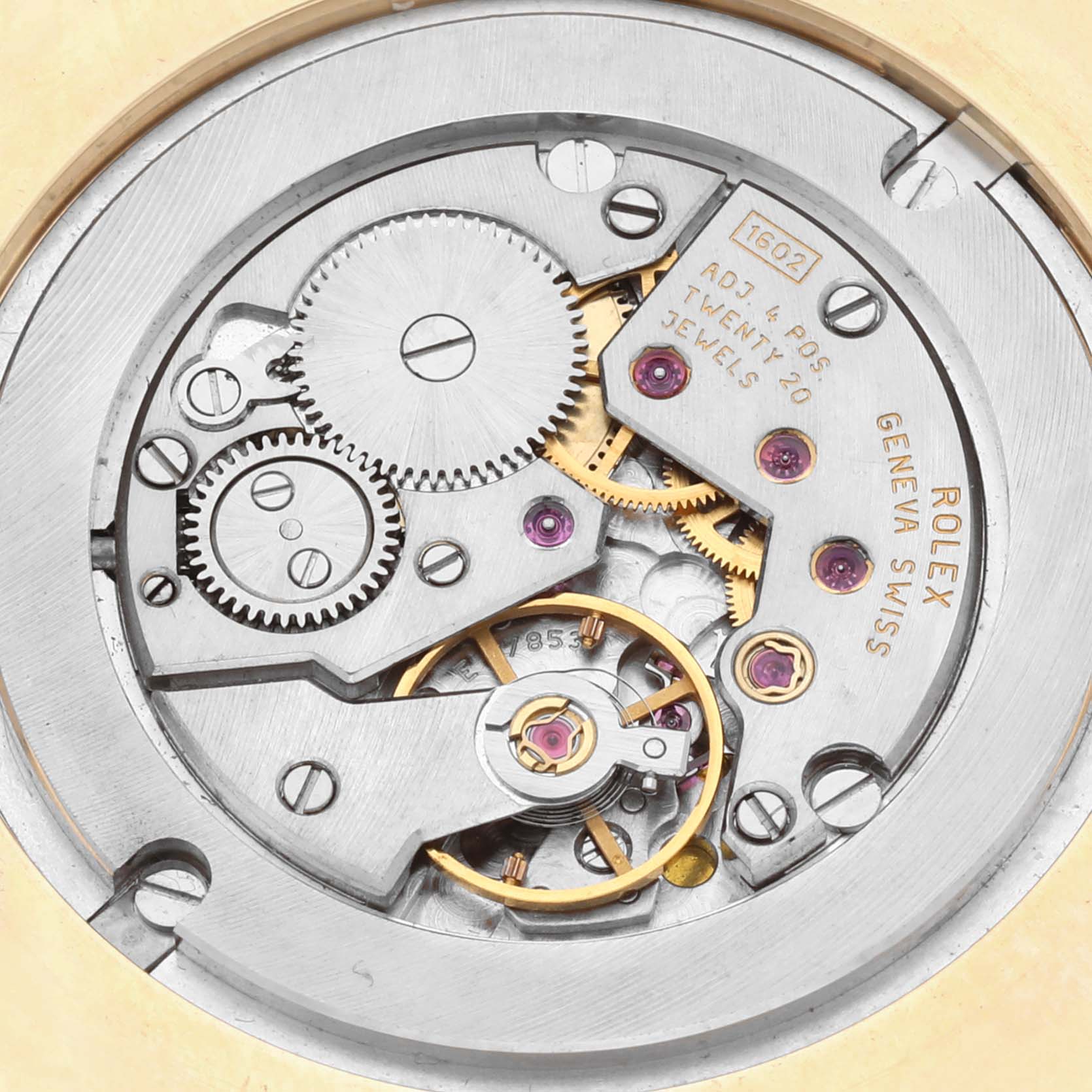 This image shows the internal mechanical movement of a Rolex Cellini 4233 Men's Yellow Gold White Dial 4233 Men's Yellow Gold White Dial watch at a close-up angle.