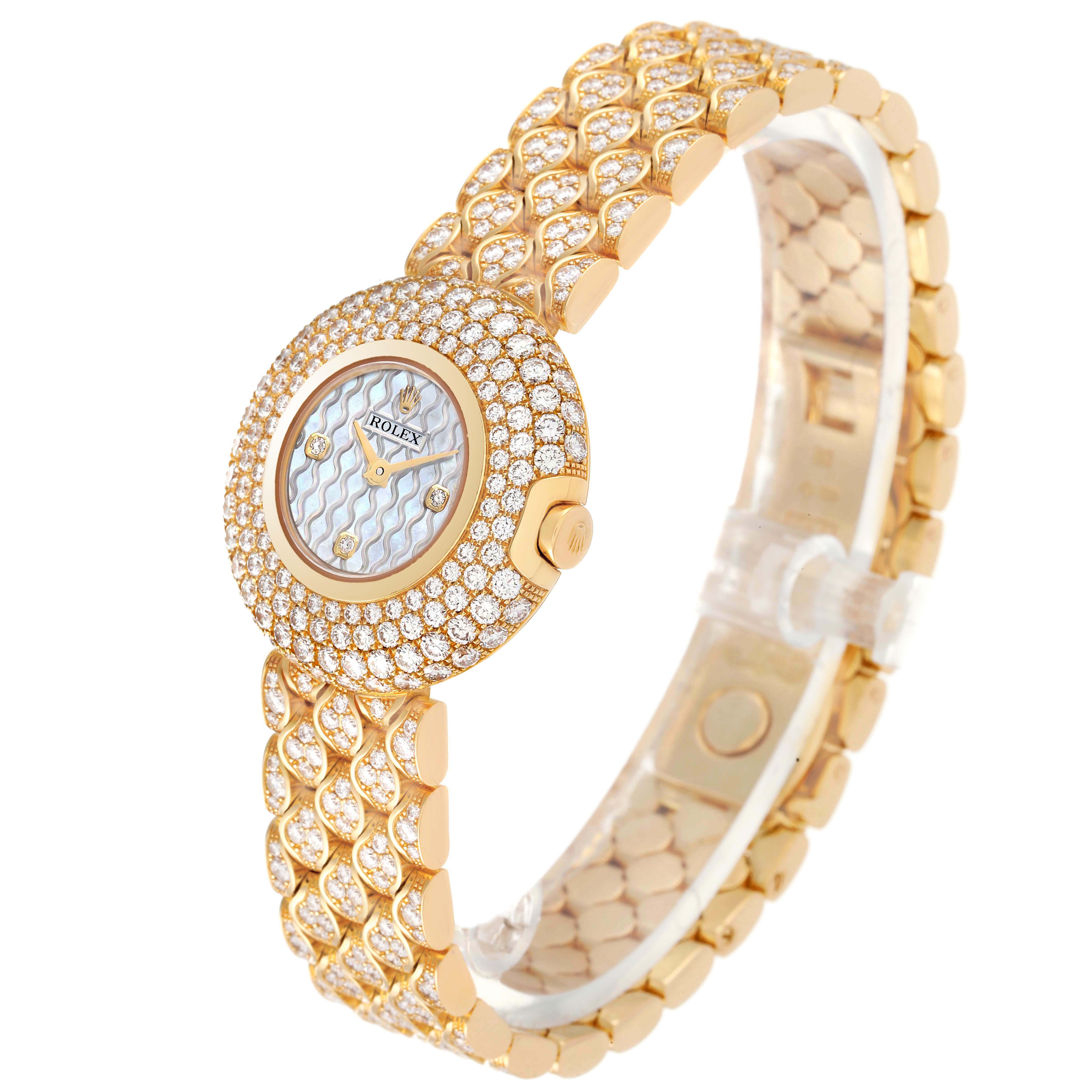 This image shows a side view of a Rolex Cellini 6221/8 Women's Yellow Gold Mother of Pearl Dial 6221/8 Women's Yellow Gold Mother of Pearl Dial watch, highlighting its gold and diamond-encrusted bracelet and bezel.