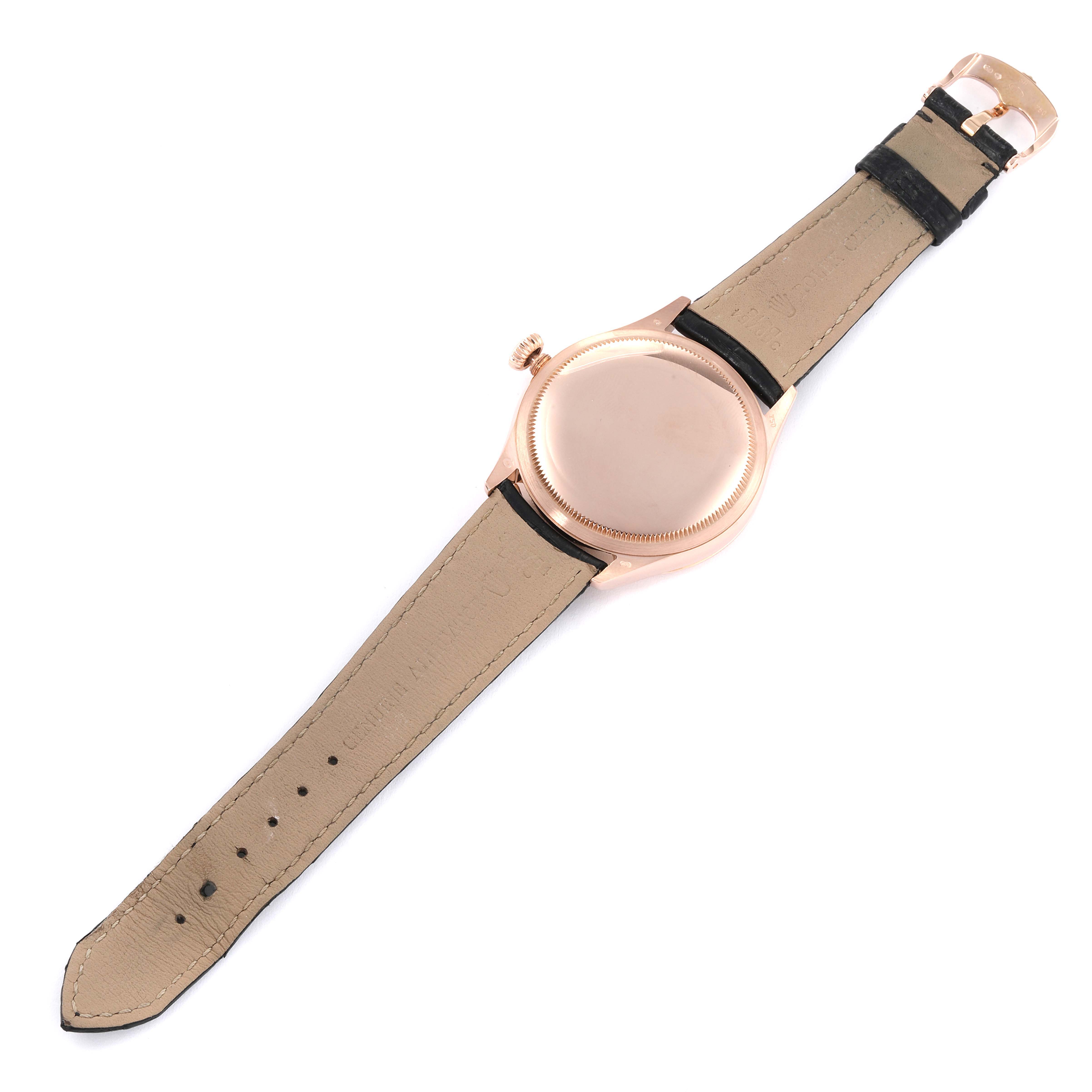 The image shows the back and strap of a Rolex Cellini 50505 Men's Rose Gold Black Dial 50505 Men's Rose Gold Black Dial watch from a top-down angle.