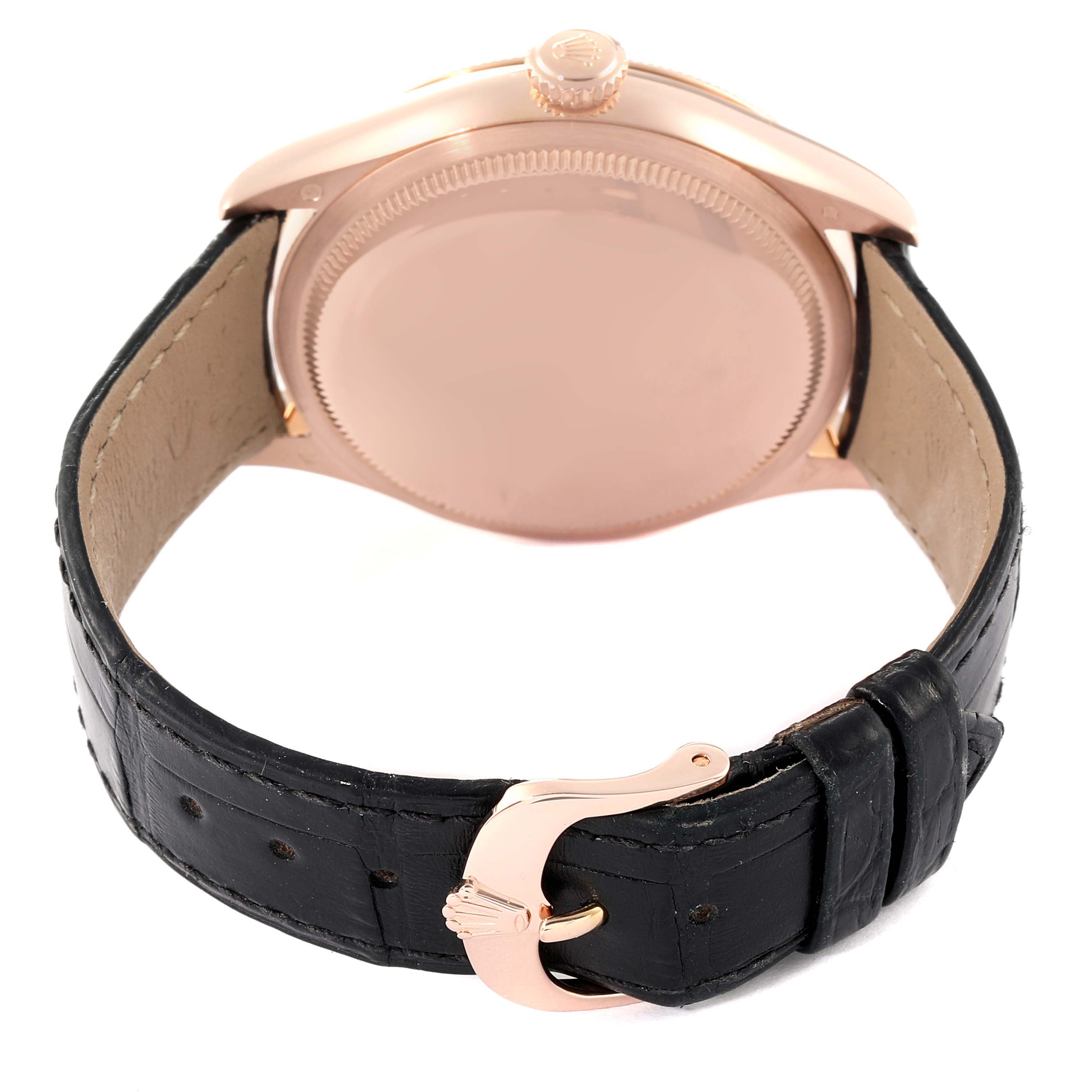 This image shows the back and buckle of the Rolex Cellini 50505 Men's Rose Gold Black Dial 50505 Men's Rose Gold Black Dial watch, featuring a rose gold case and black leather strap.