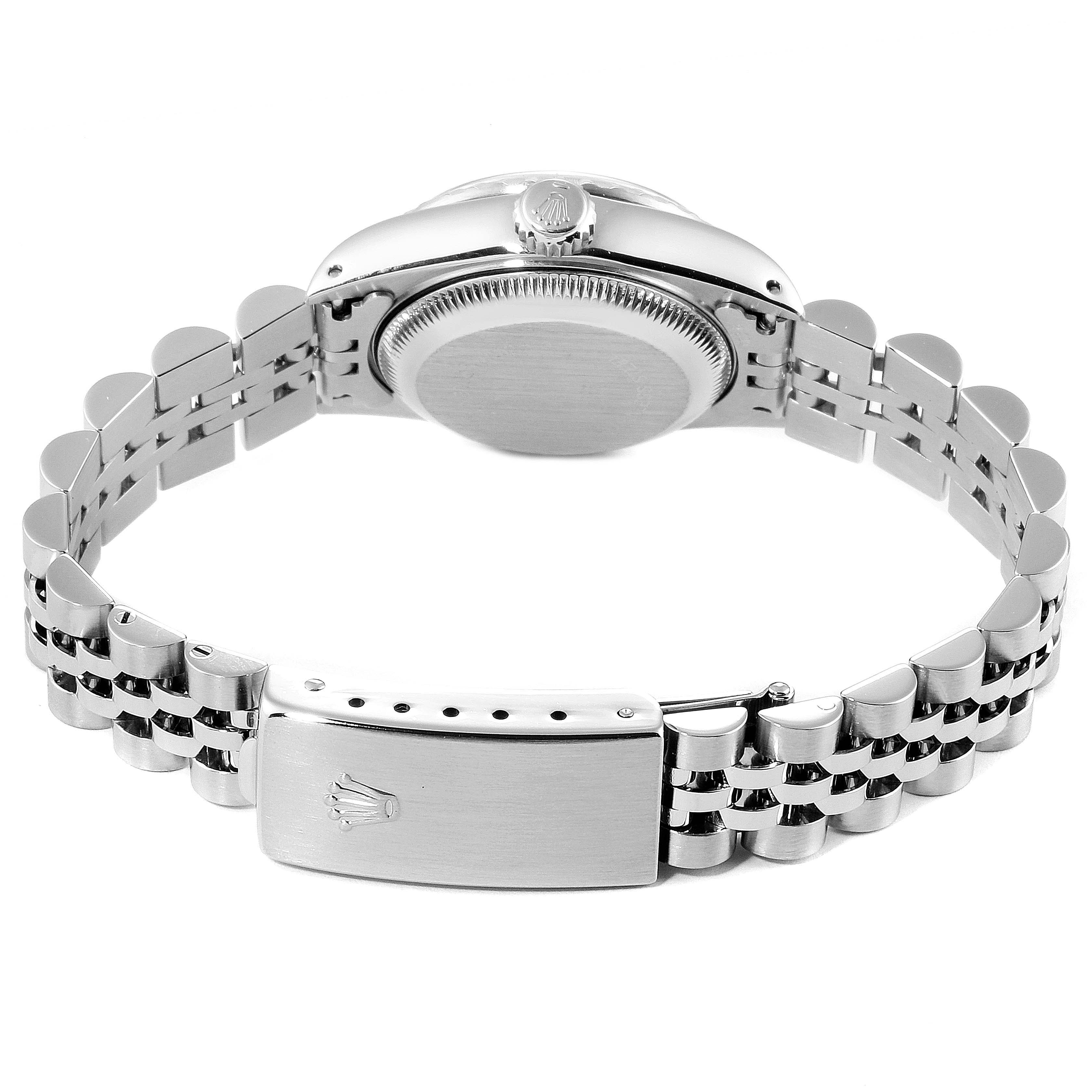 This image shows the back view of the Rolex Date 69240 Women
s Stainless Steel Pink Dial 69240 Women
s Stainless Steel Pink Dial model watch, focusing on its case back and stainless steel bracelet with clasp.